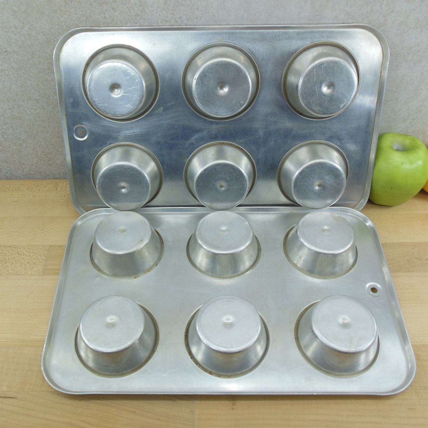 REMA USA Pair Insulated AirBake Aluminum 6 Hole Muffin Cupcake Pans bottom