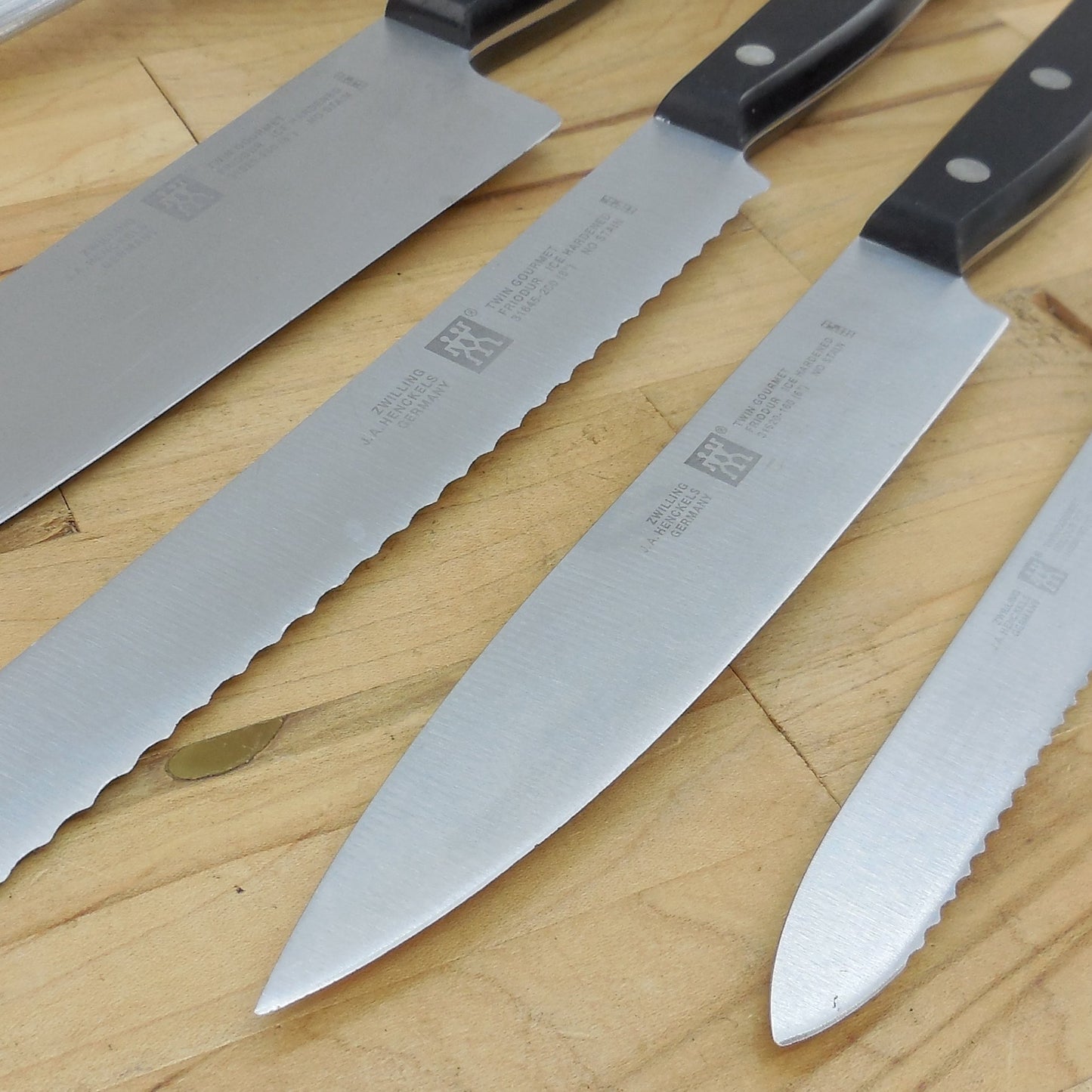 J. A. Henckels Germany Stainless 4 Knife Set & Hone Ice Hardened 316 Series Serrated