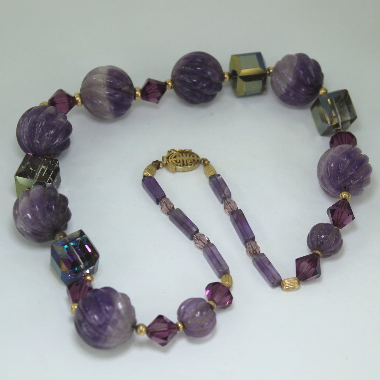 Brilliant Purple Bead Necklace Iridescent Cube Possible Brighton table view