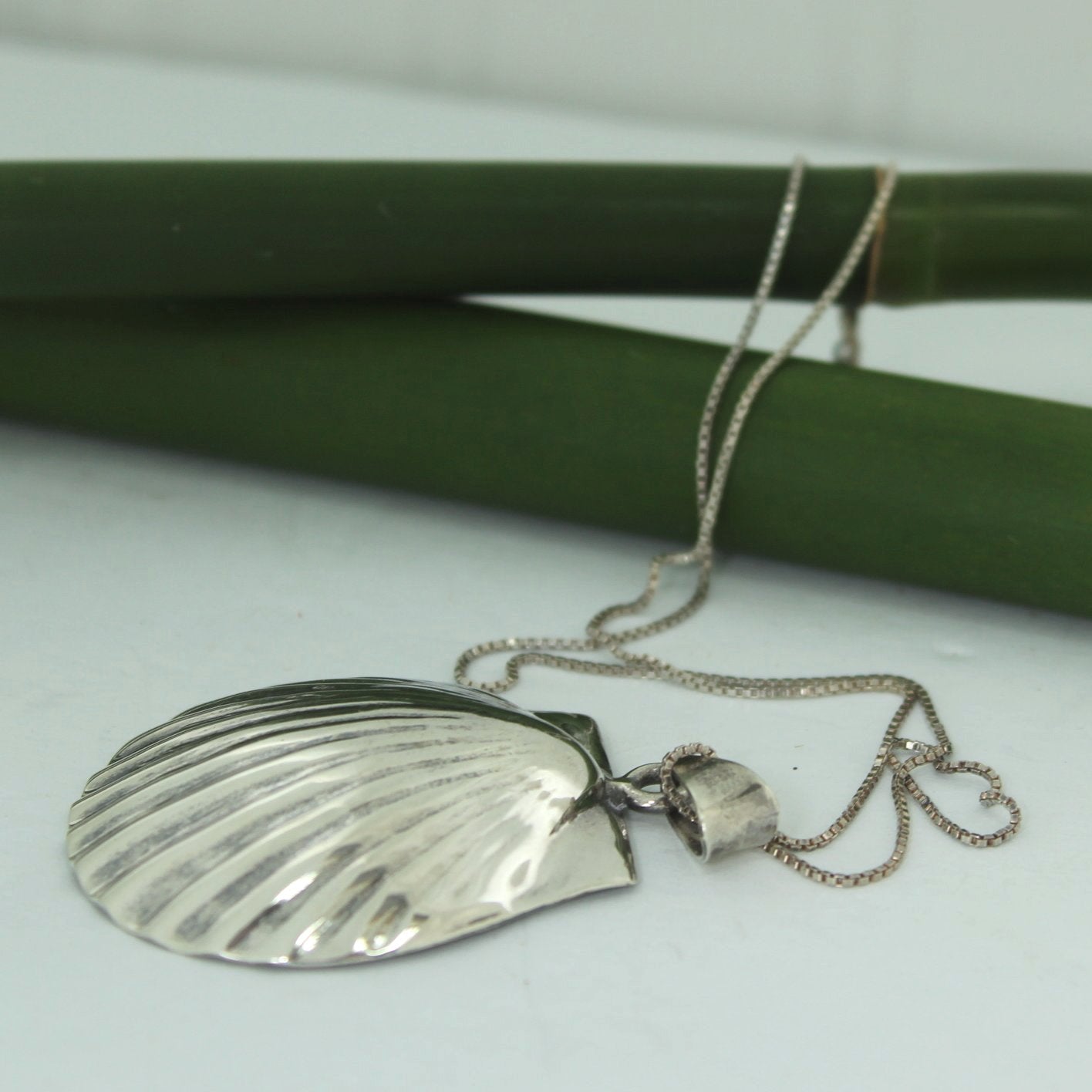 Vintage Pendant Necklace Dimensional Scallop Shell 925 Sterling Silver side view of shape
