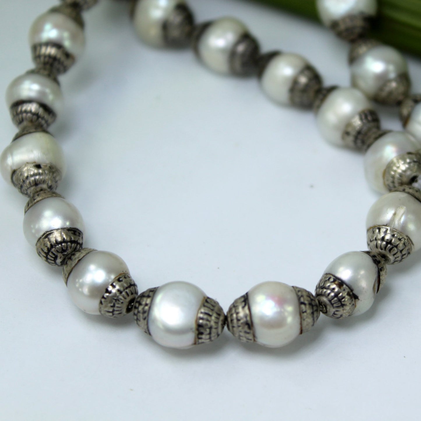 Necklace String Fresh Water Pearls Silver Spacers Wear DIY Jewelry closeup individual beads