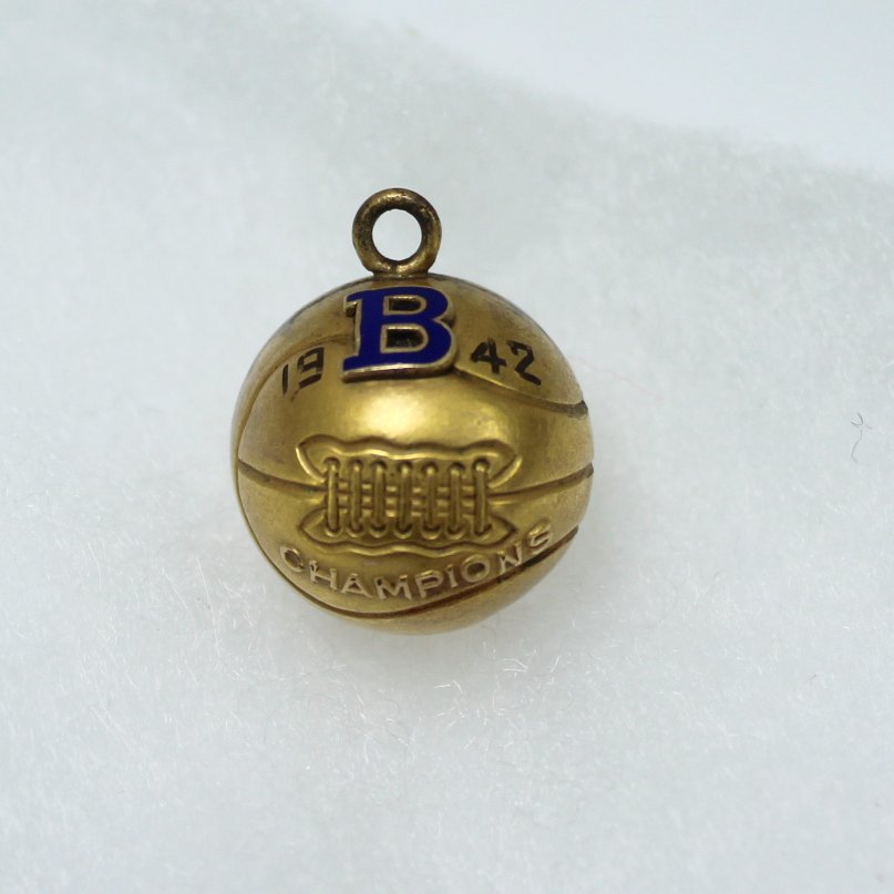 Vintage 1942 Basketball 1/10 10K Gold Enamel Charm closeup view of ball