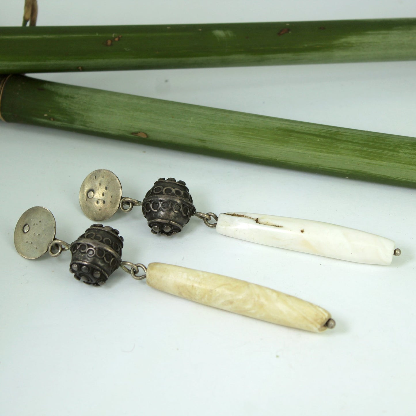 Vintage African Tribal Long Earrings Dangle Metal Shell 4 1/2" Long table flat view