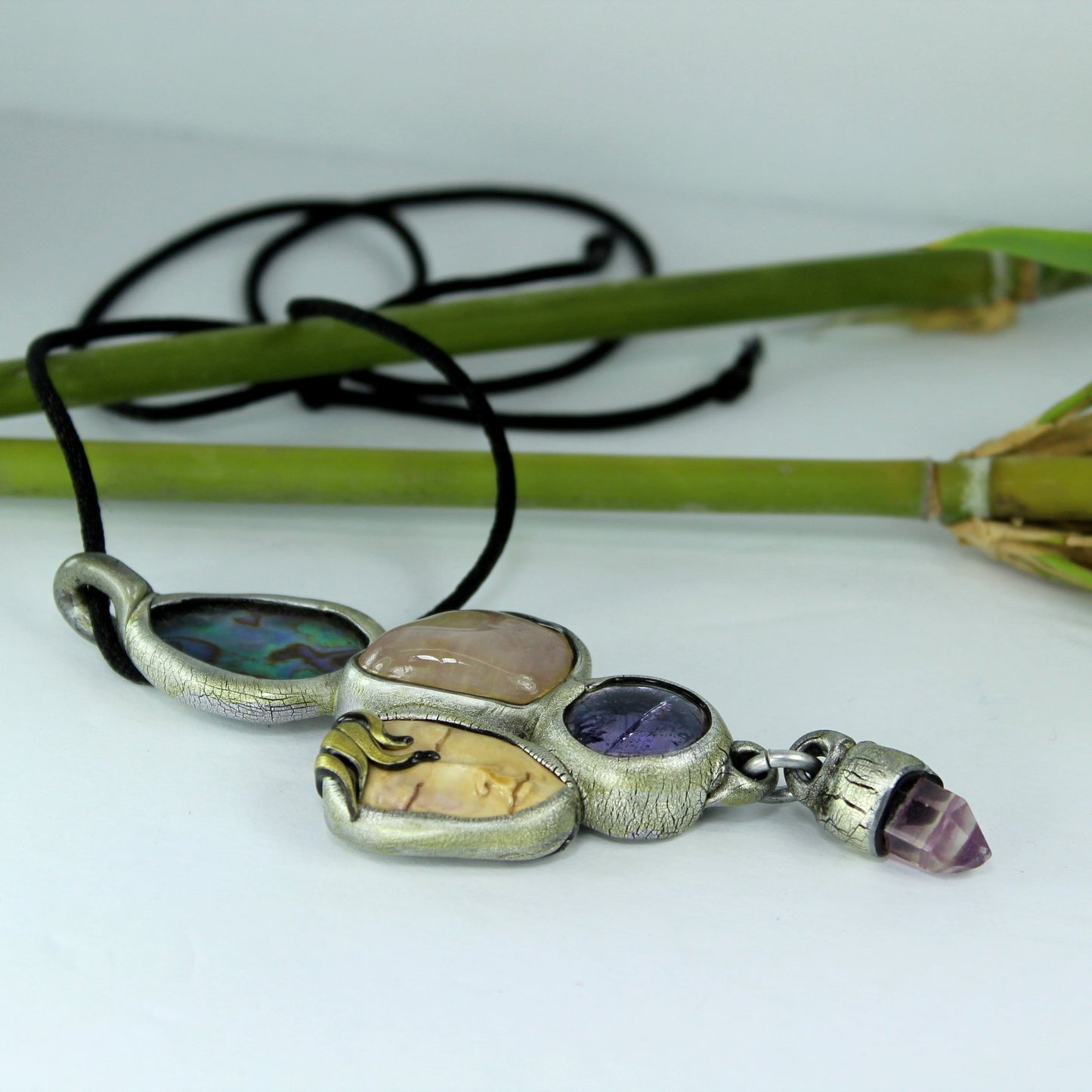 Susan Sorrentino Necklace Vintage Early Work Face Stones side view pendant