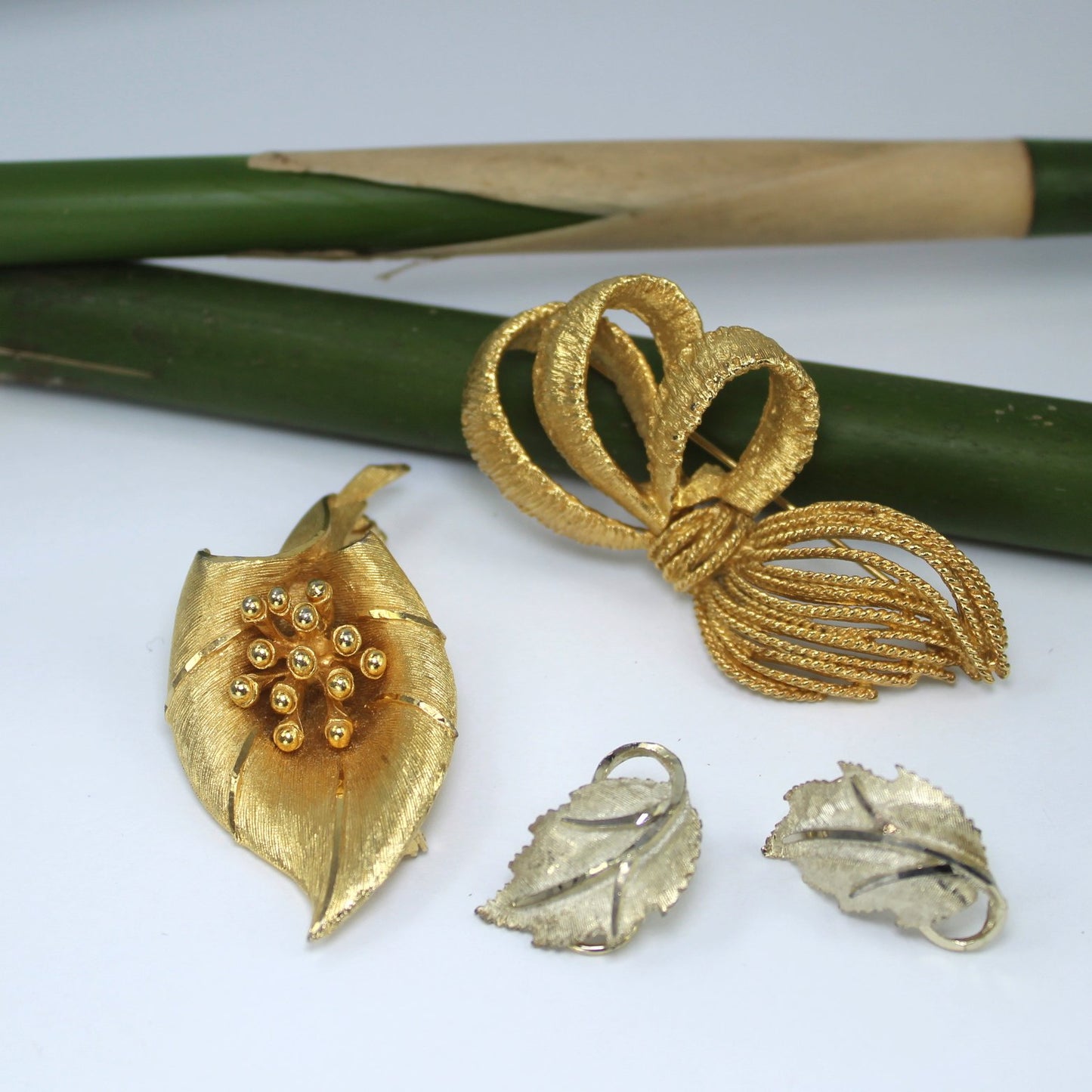 BSK Designer Collection 3 Bow Pin Leaf Pin Clip Earrings Top Quality other view fronts
