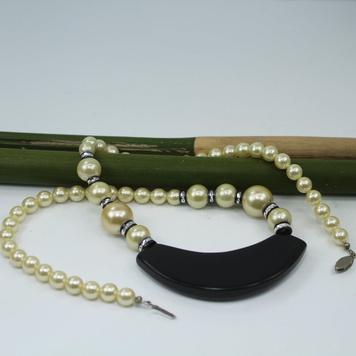 Unusual Necklace Mother of Pearl On Black Crescent Pearl Chain Black Accents reversse of crescent focal