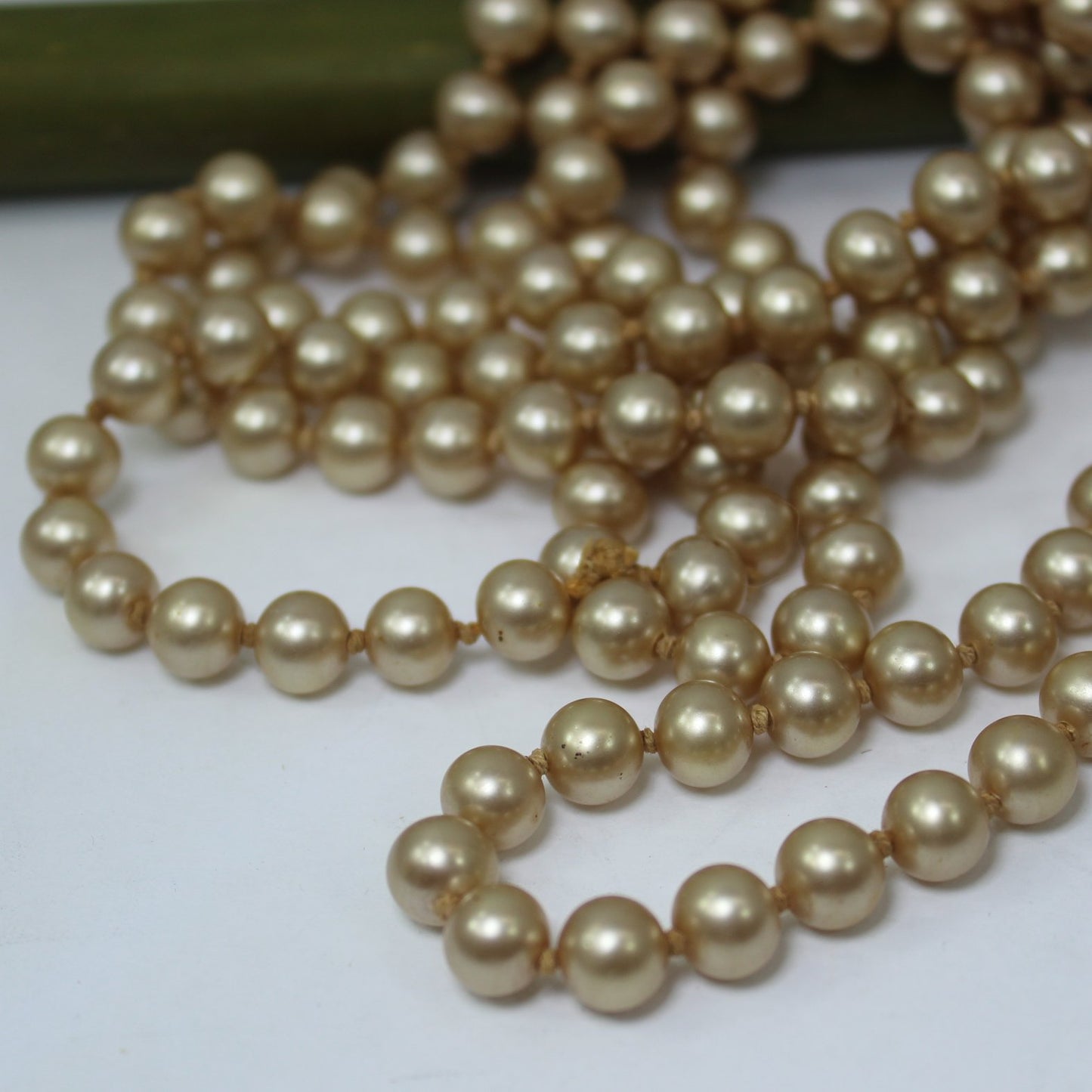 Rope Length 57" Necklace Faux Champagne Pearls Individually Knotted Vintage closeup pearls