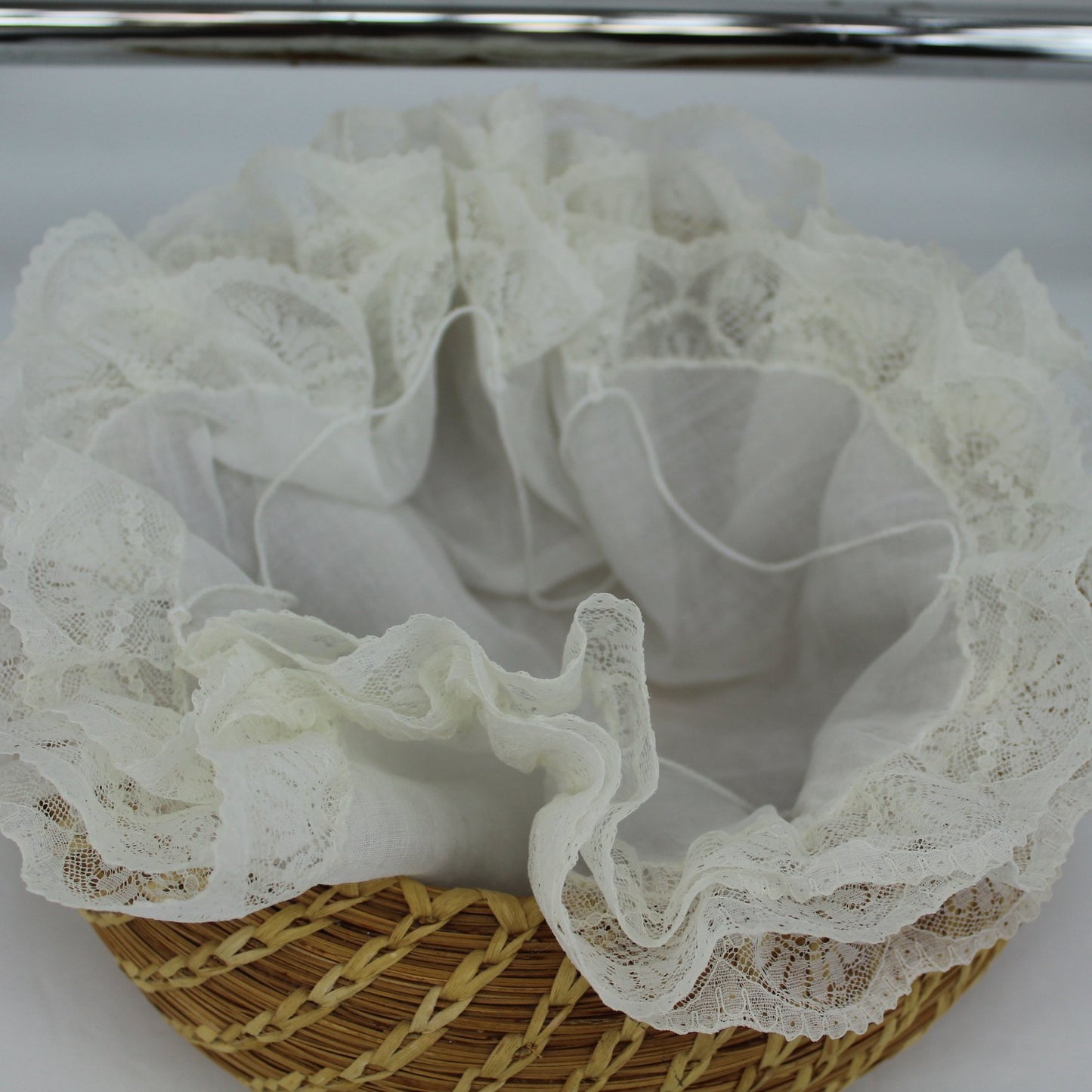 Basket White Organdy Bun Keeper Warmer Pockets With Cord Closing showing inside