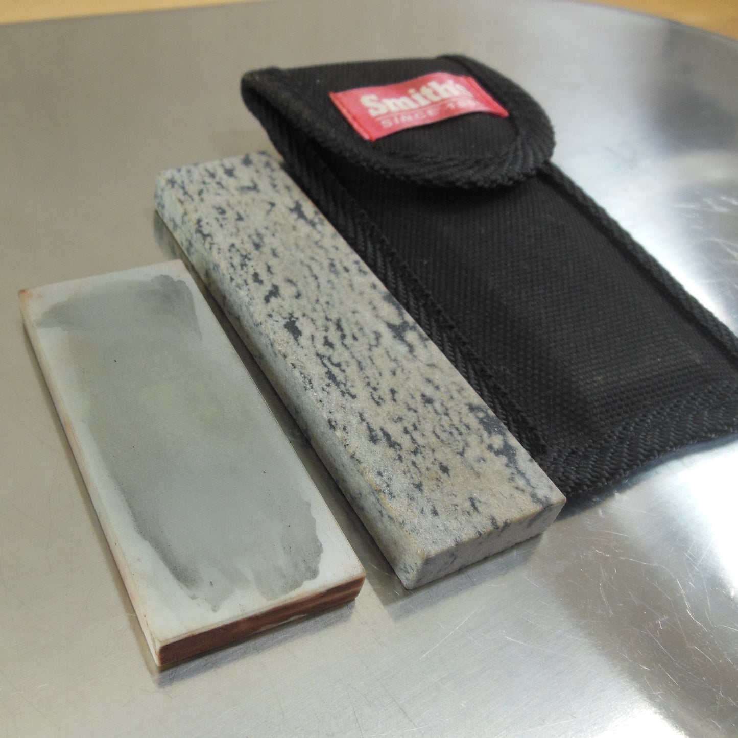 Arkansas Oilstone Co. & Smith's Belt Sheath Sharpening Stones used