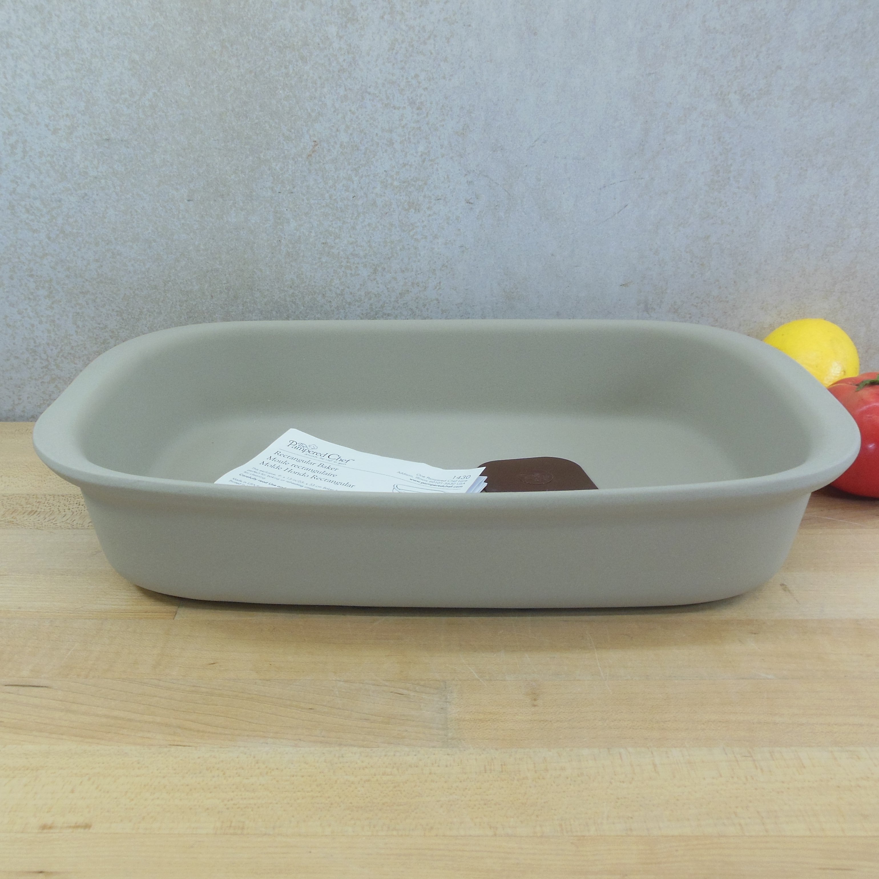 The Pampered Chef Pizza Stone, 9x13 Baker & Loaf Pan - Sherwood Auctions