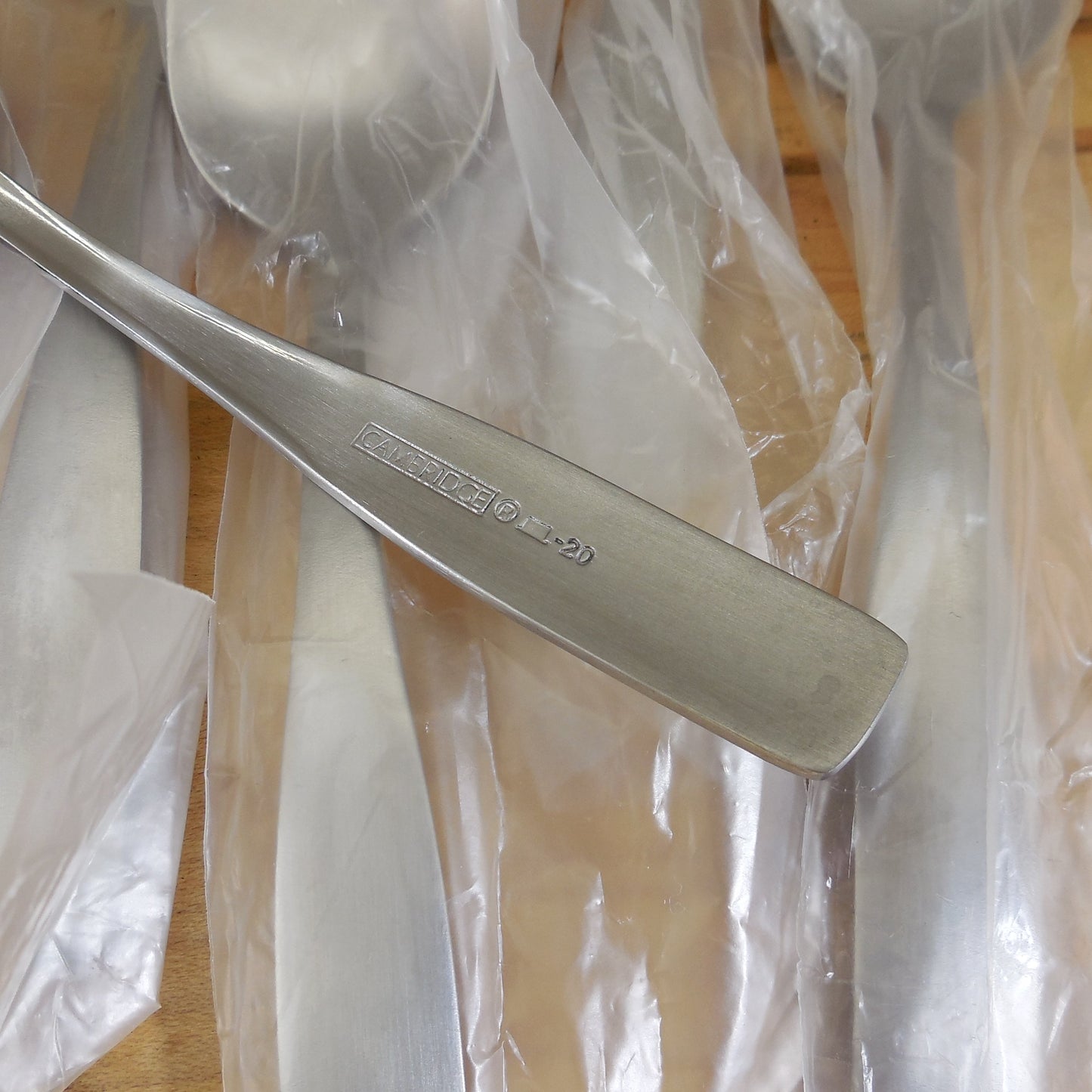 NIP Cambridge Madison Stainless Flatware - 8 Teaspoons New Plastic Sleeves