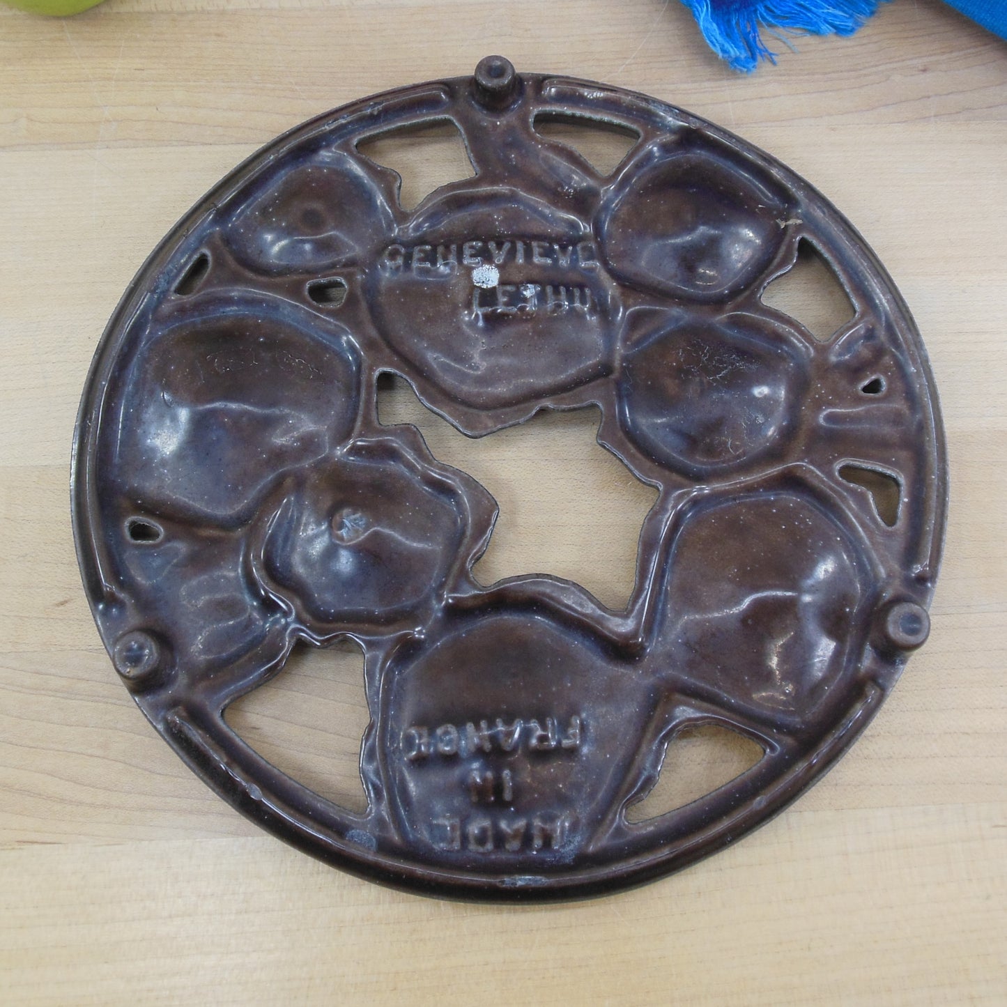 Genevieve Lethu France Brown Enamel Flowers Cast Iron Trivet vintage used