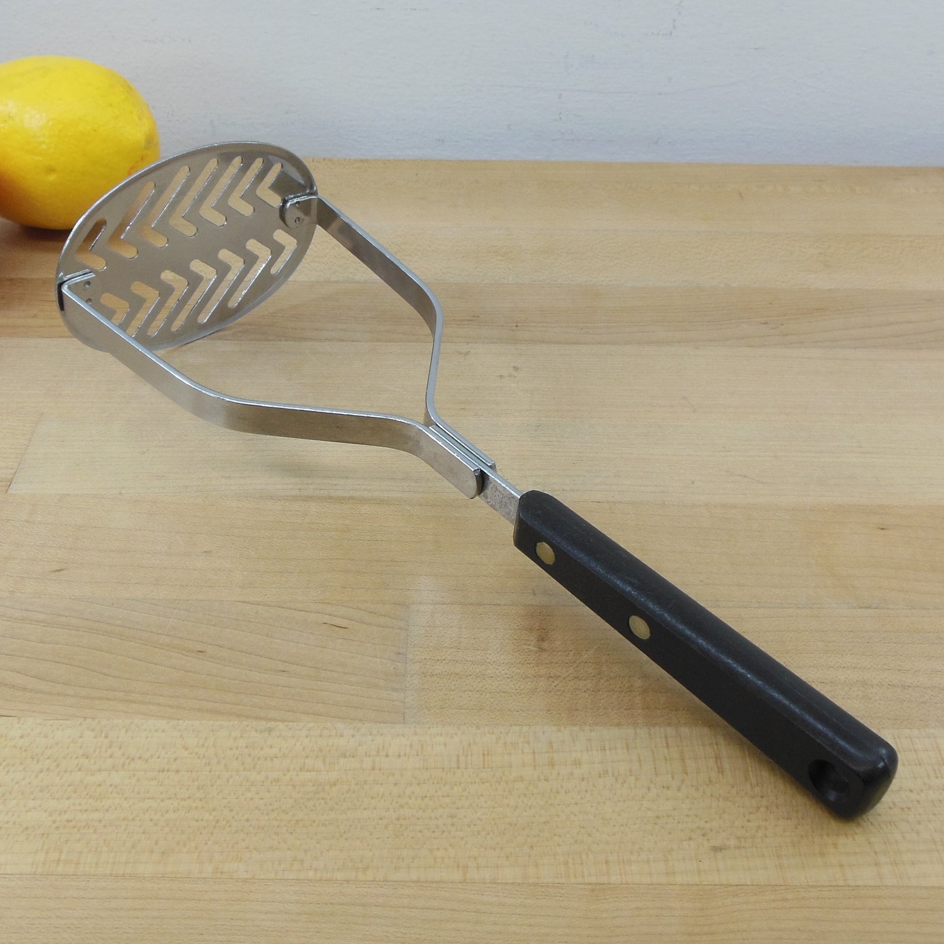 Ekco Forge USA Stainless Potato Vegetable Masher Black Handle - Oval