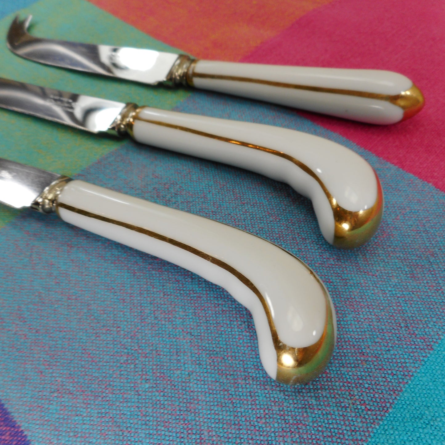 Sheffield England 3 Stainless Cheese Knives Picks - White Porcelain Gold Stripes Pistol Grip Handles