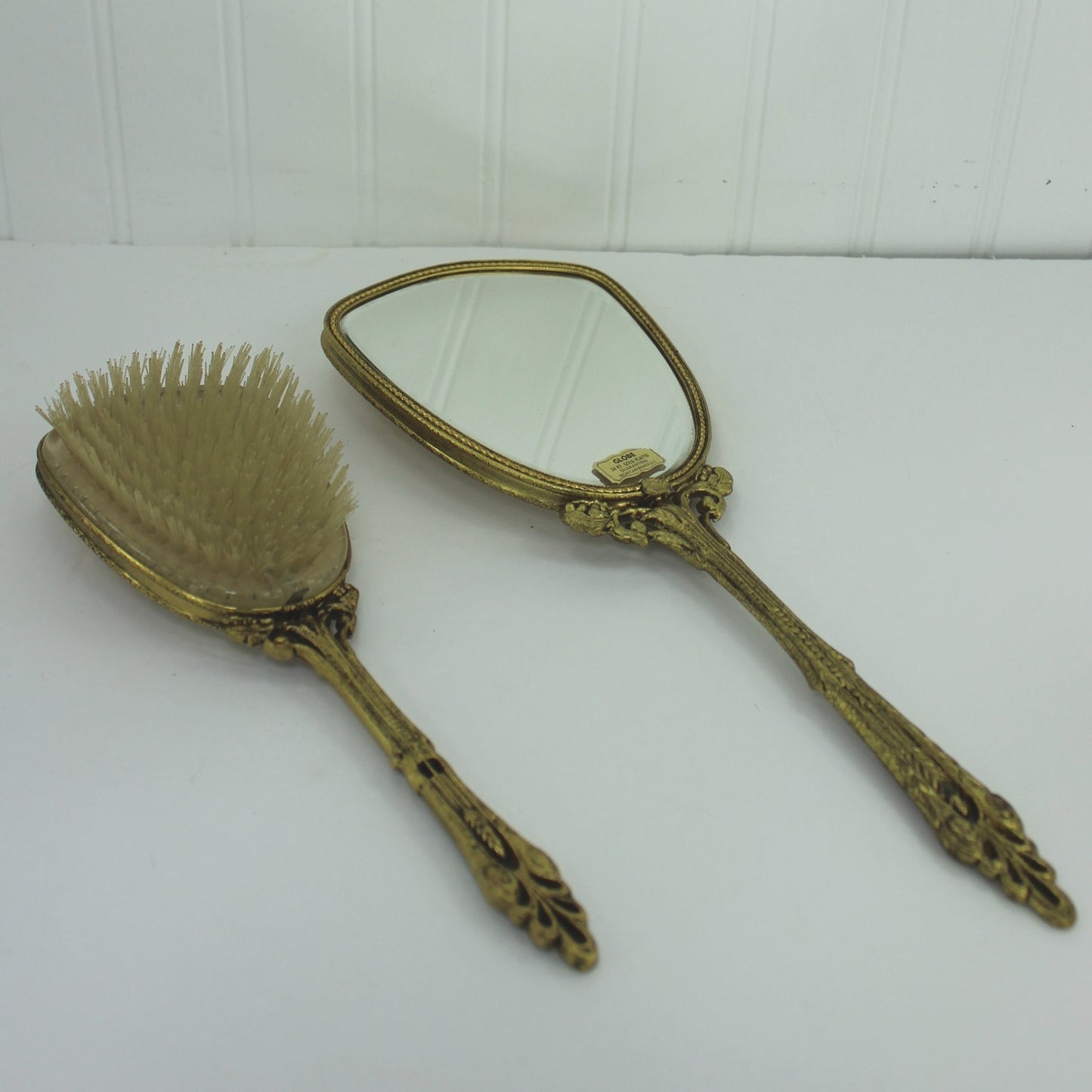 Vintage Globe 1950s Vanity Set Hand Mirror Brush Roccoco 24K Plate bristles good condition