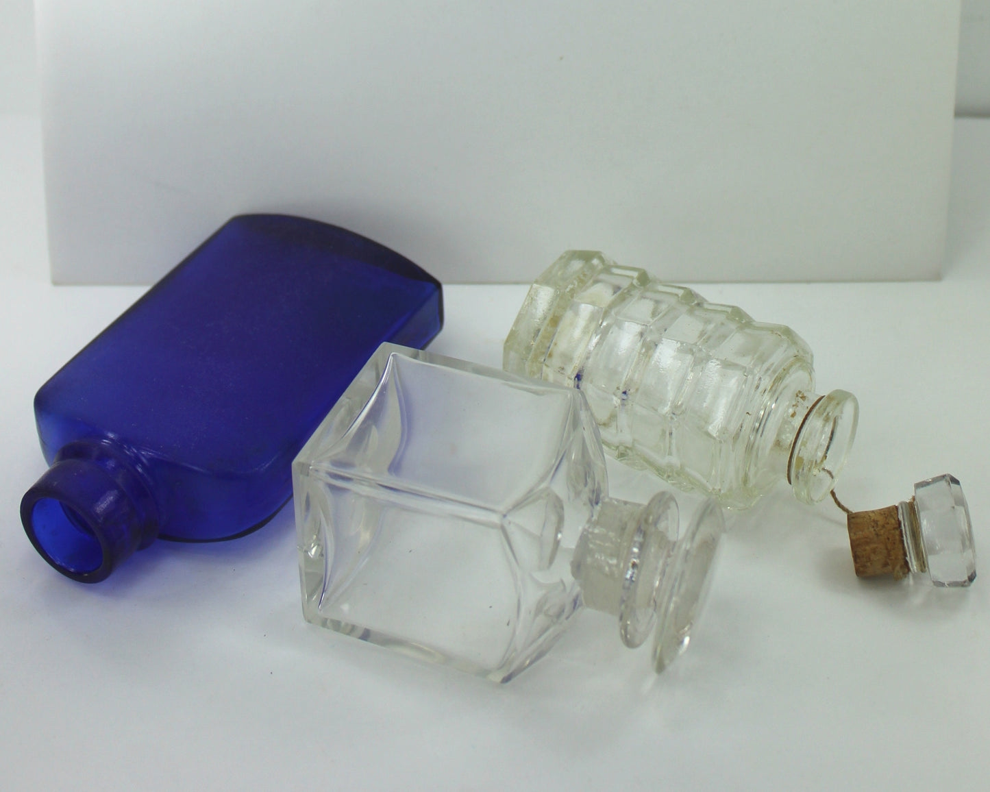 Collection 3 Old Glass Perfume Medicine Empty Bottles Cobalt Cork Stopper clear glass iround ndentations