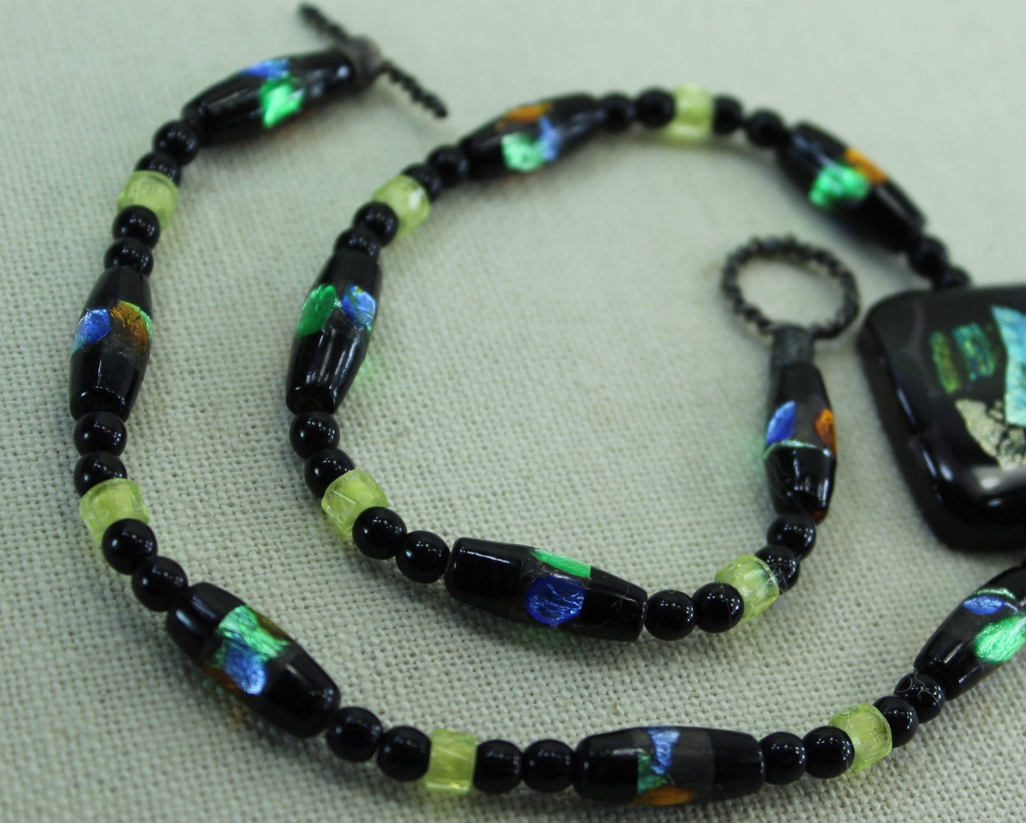 Artisan Dichoric Glass Necklace Black with Vibrant Colors yellow