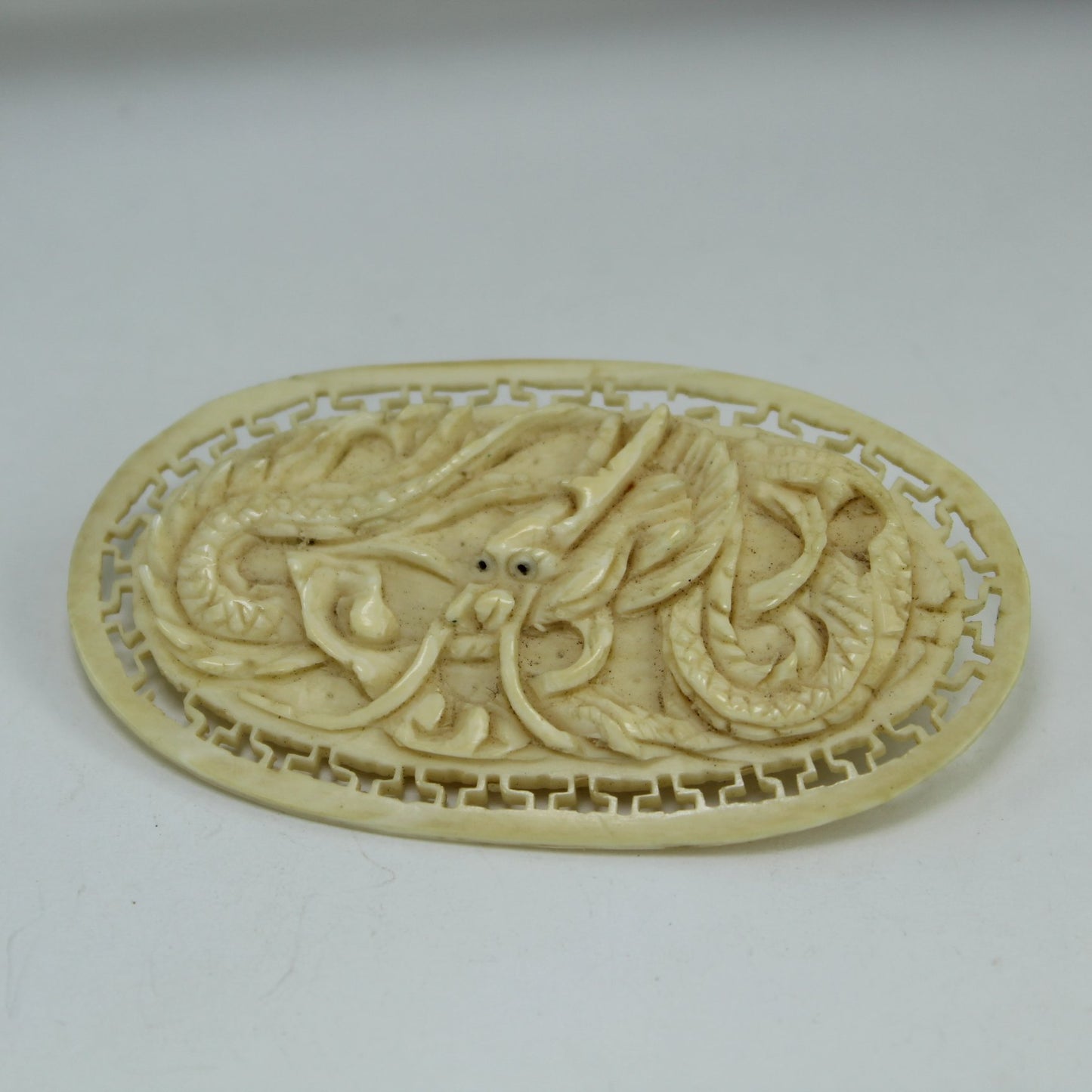 Antique China 2 Pins Brooches Intricate Ivory Brown Stone Estate dragon pin closeup