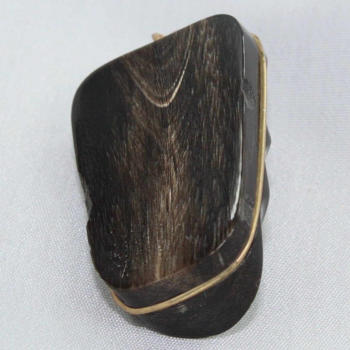 Artisan Mask Pendant - Black Grained Stone Gold Color Wire Wrap Back