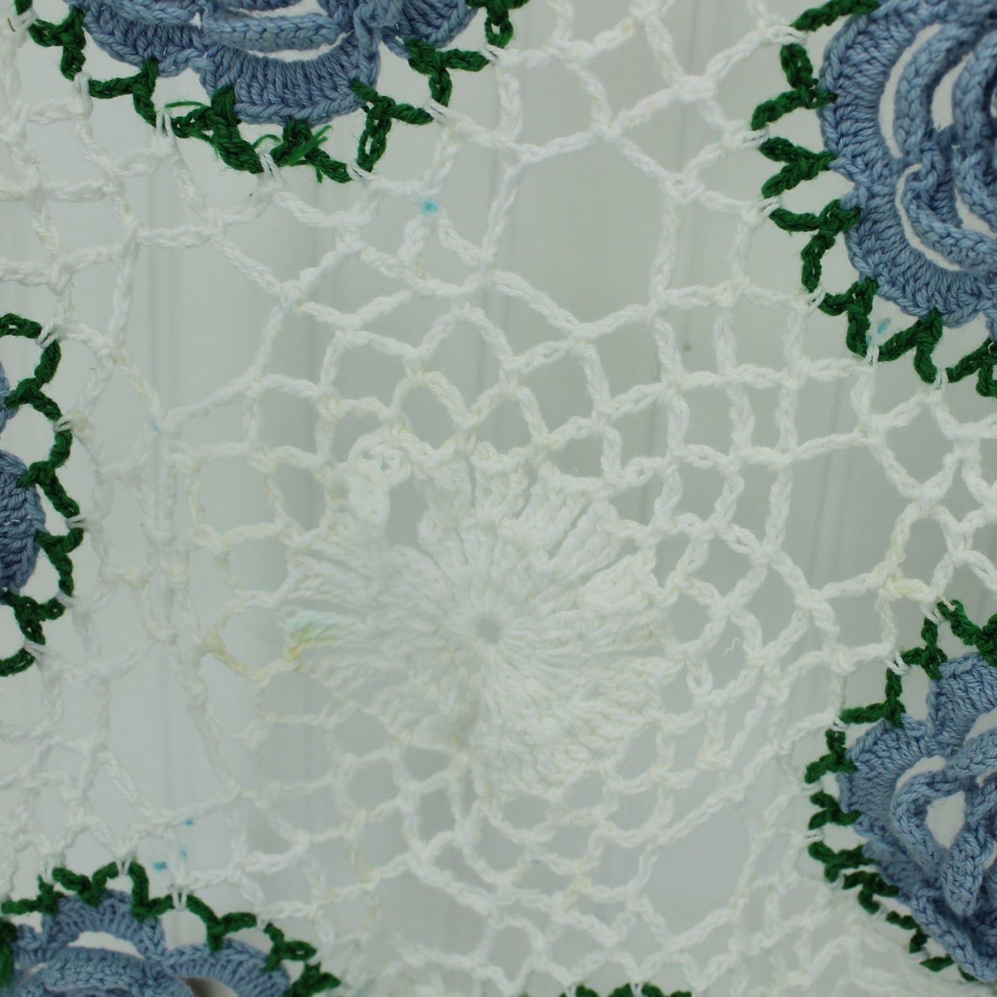 Pair Crochet Doilies Raised Dimensional Flowers Grey Aqua and Blue on White stain loose stitch closeup