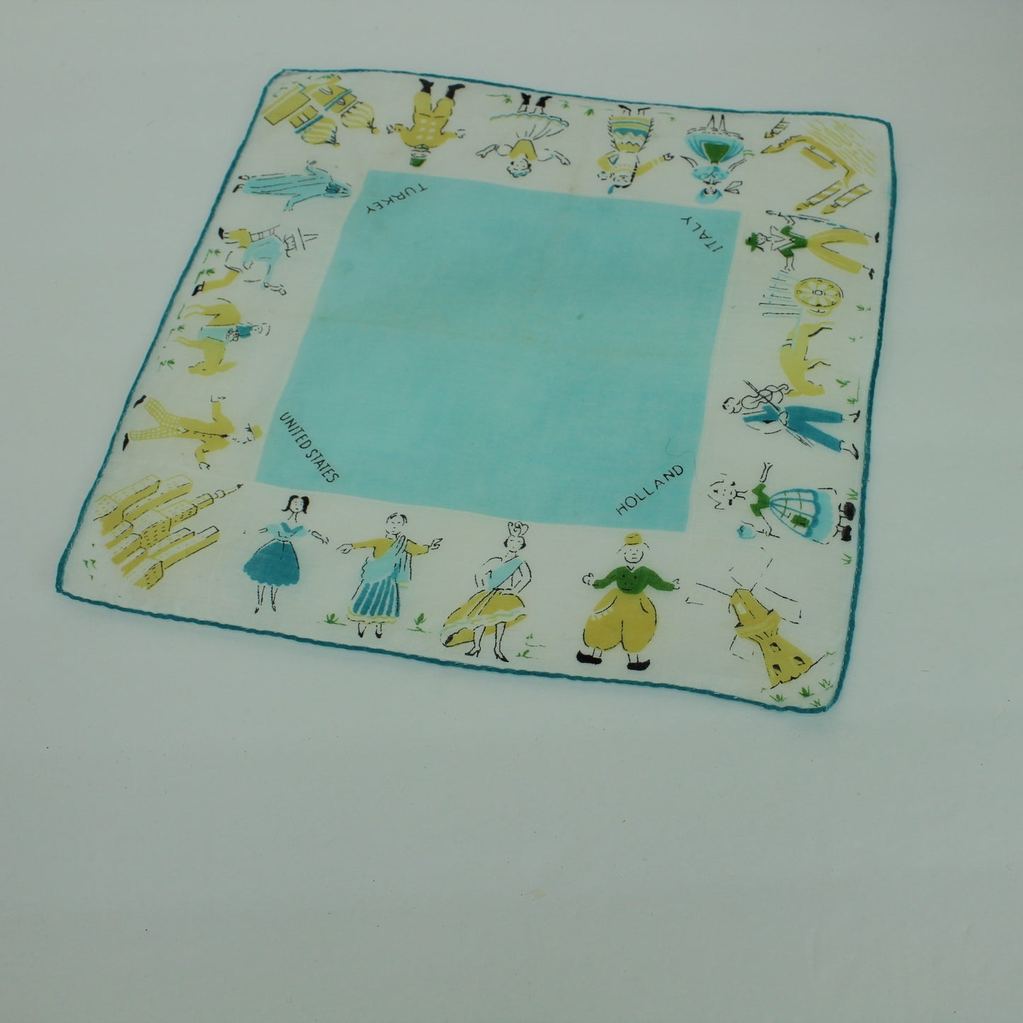Collection 6 Children's Handkerchiefs International & Days of Week closeup international costume hankie