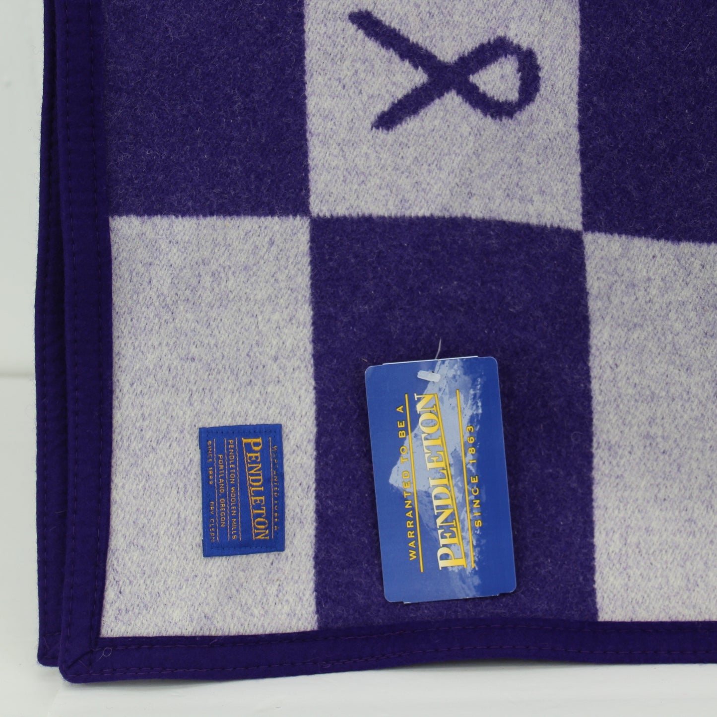 New With Tags Pendleton Wool Cotton Blanket Purple Ribbon Domestic Violence paper hang tag and maker ribbon sewn on tag