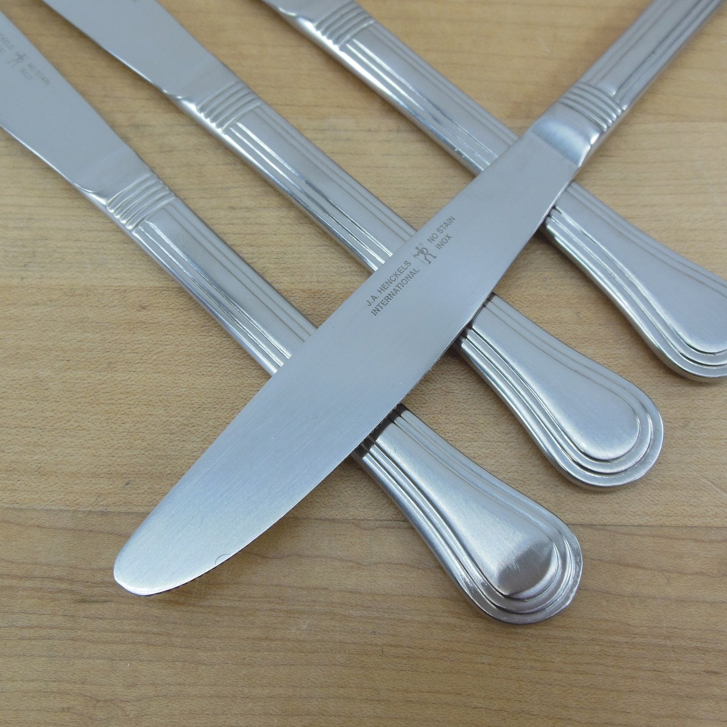 J.A. Henckels Astley Satin Stainless Flatware - 4 Table Knives used