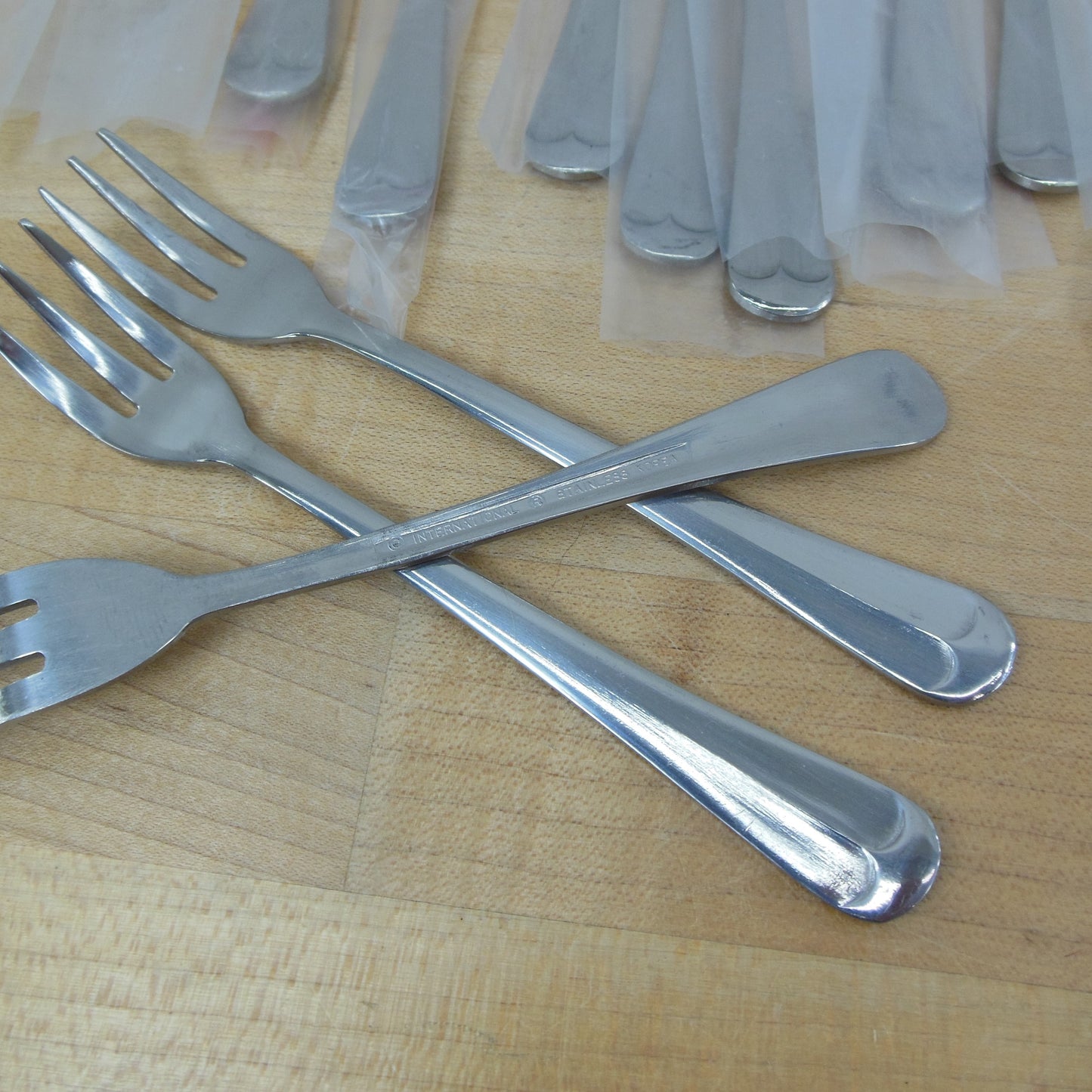 International Korea Cape Cod Stainless Flatware NIP Seconds - 12 Cocktail Seafood Forks new with defects