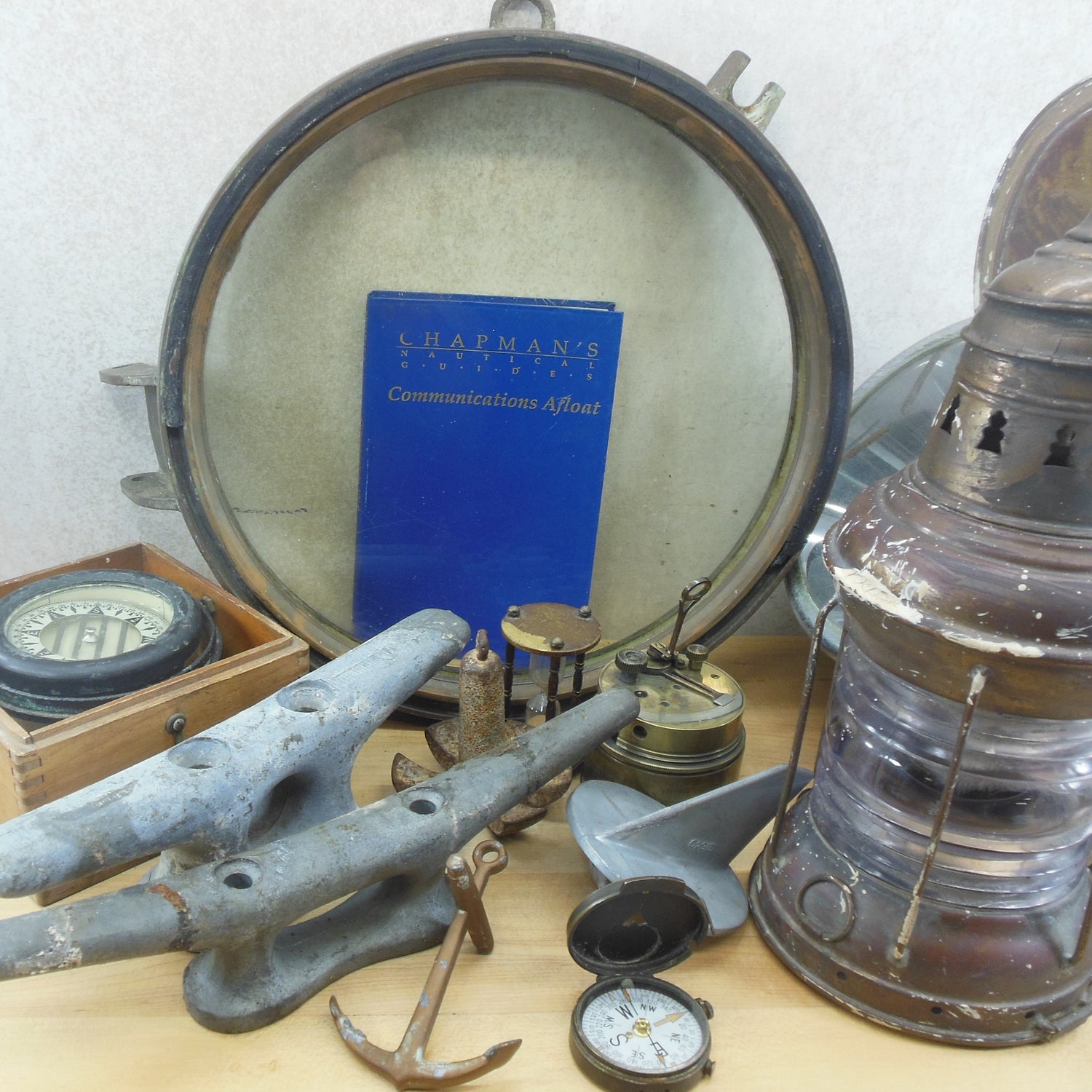 Our antique, vintage and newer collection of maritime, nautical, boat items... ship, anchors, lanterns, rope, engine parts, portholes, compasses, sextons, and marine salvage.