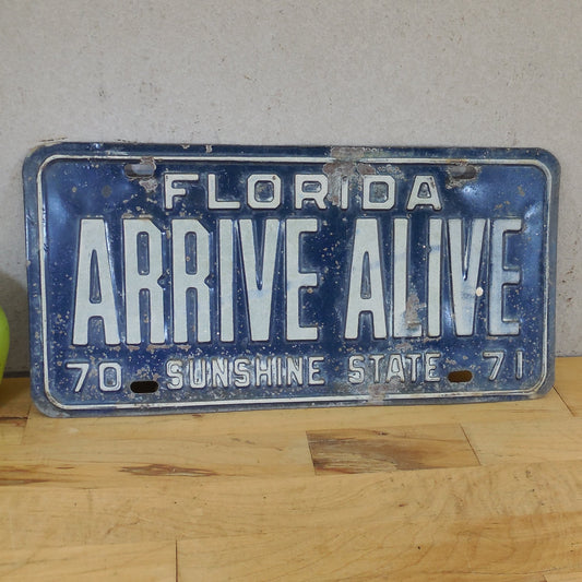 Florida 1970-71 License Plate Tag Arrive Alive Blue White