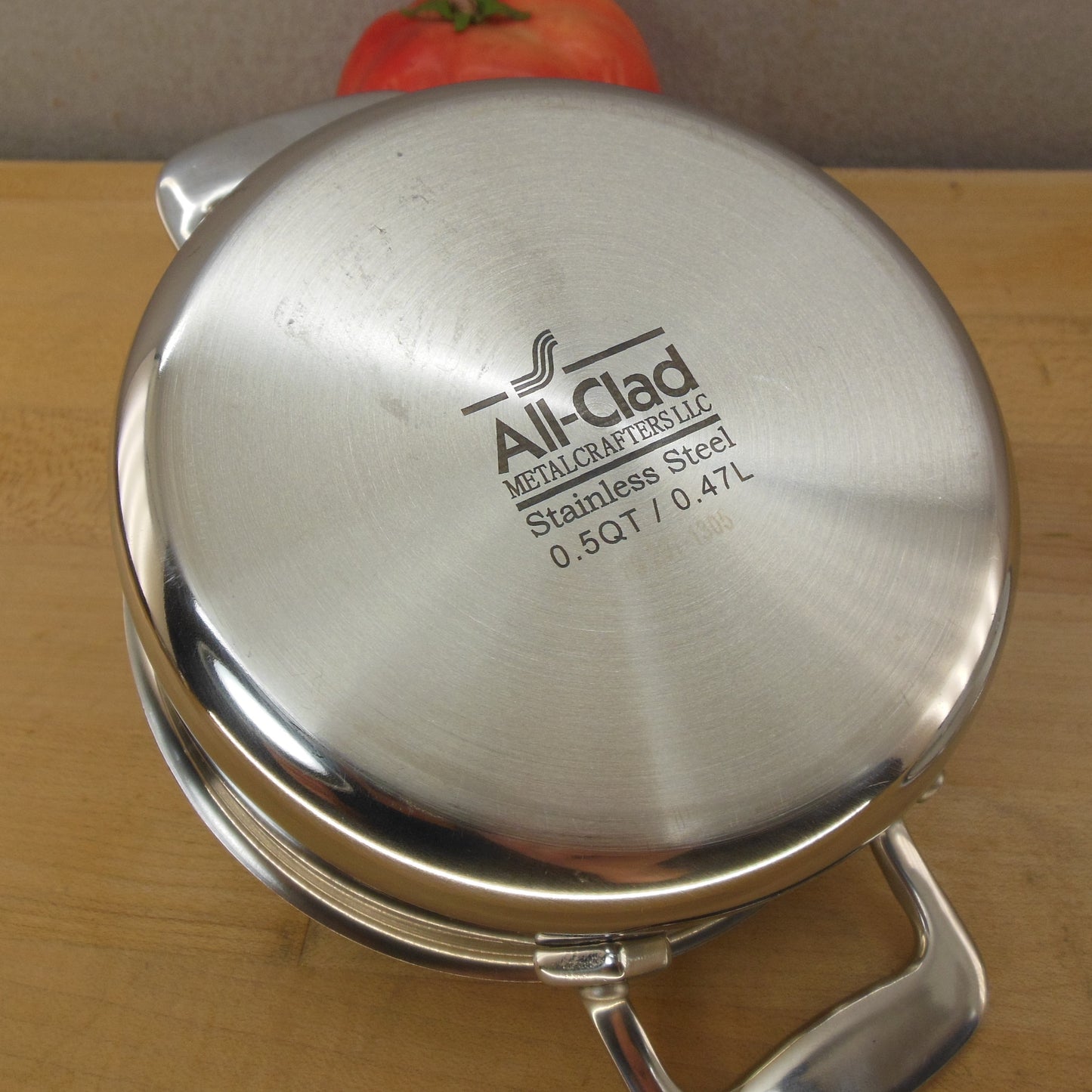 All-Clad Metalcrafters Stainless 0.5 Quart Mini Cocotte Pot Logo