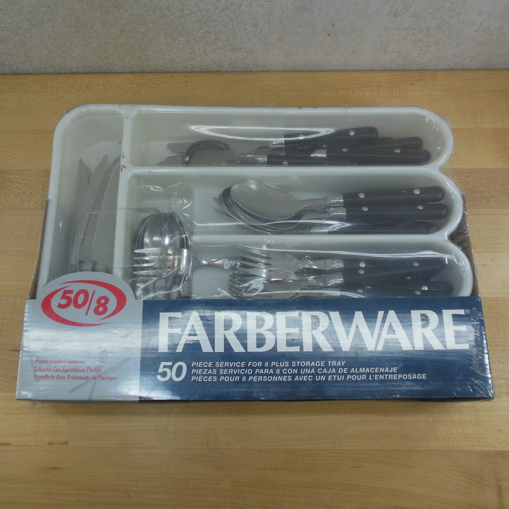 Farberware Flatware 50/8 Set Stainless With Black Plastic Handle NOS