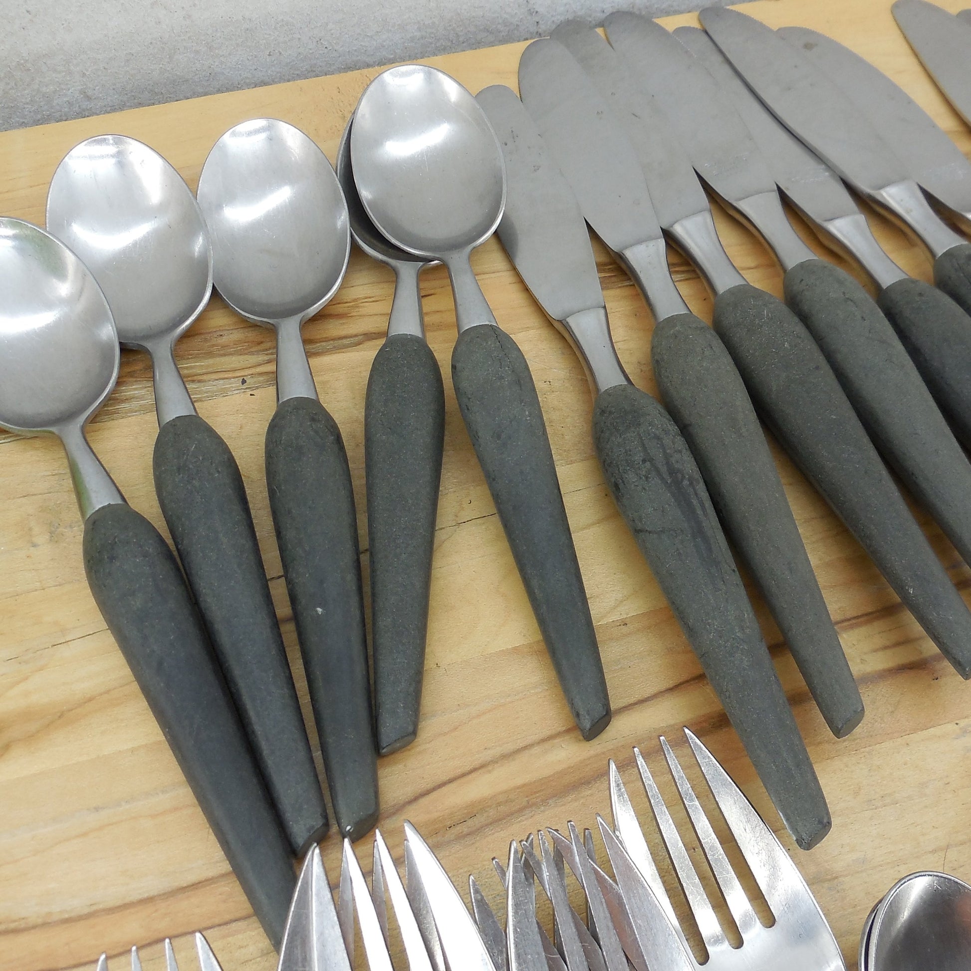 Grenadier Japan Forged Stainless Black Handle Flatware 48 Pc. Lot Unpolished