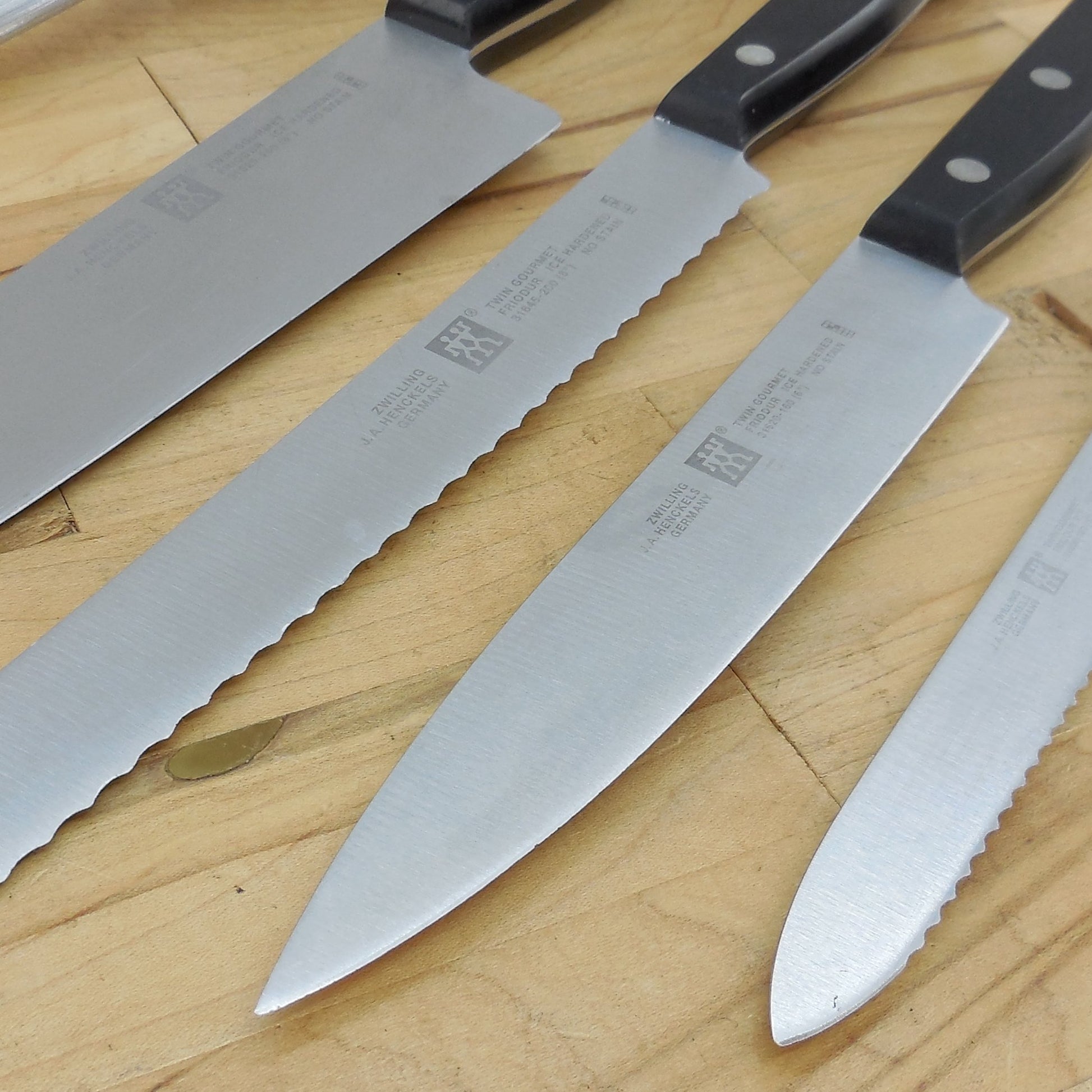 J. A. Henckels Germany Stainless 4 Knife Set & Hone Ice Hardened 316 Series Serrated