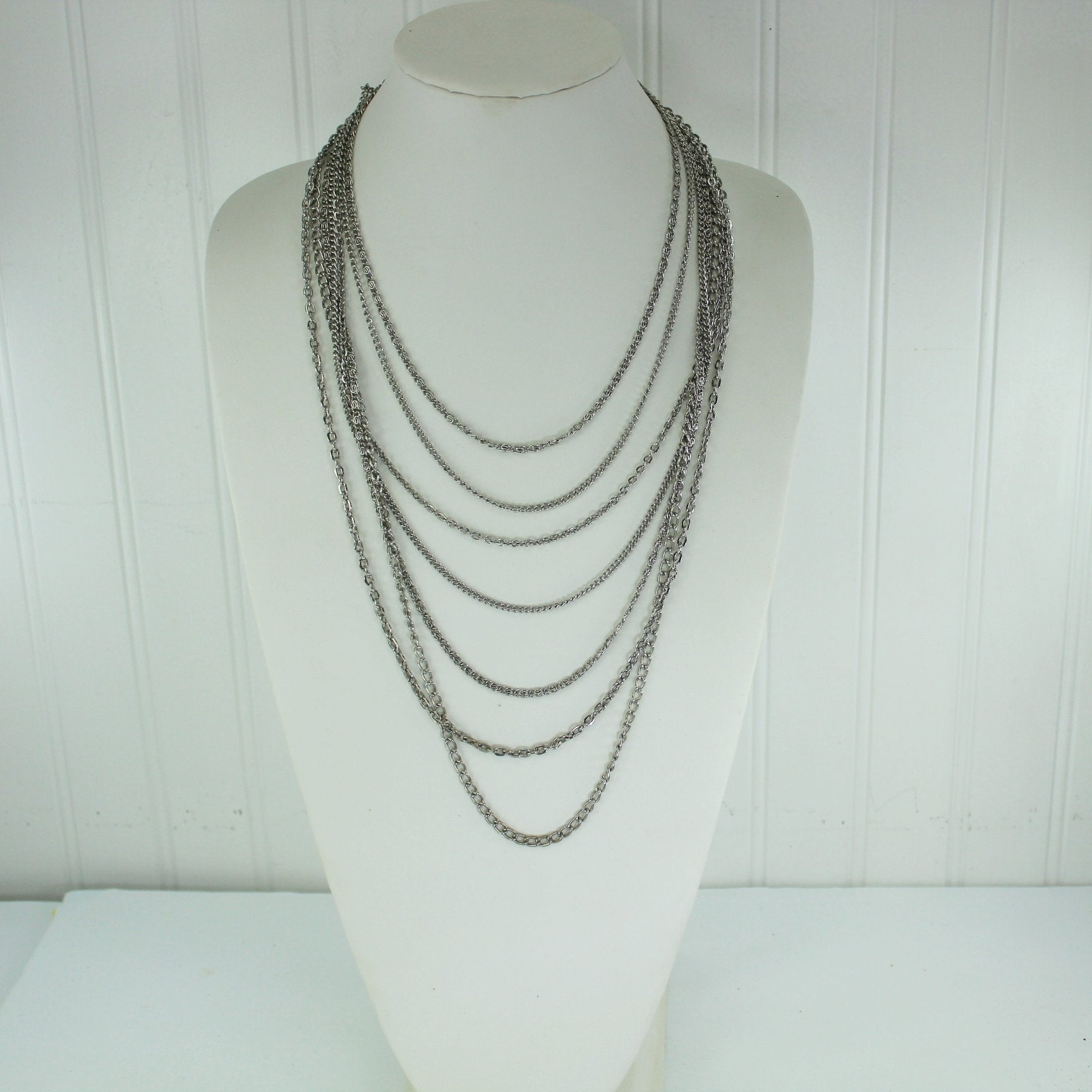 Vintage Necklace 7 Silver Chains Graduated Lengths Large Silver Clasp on neck