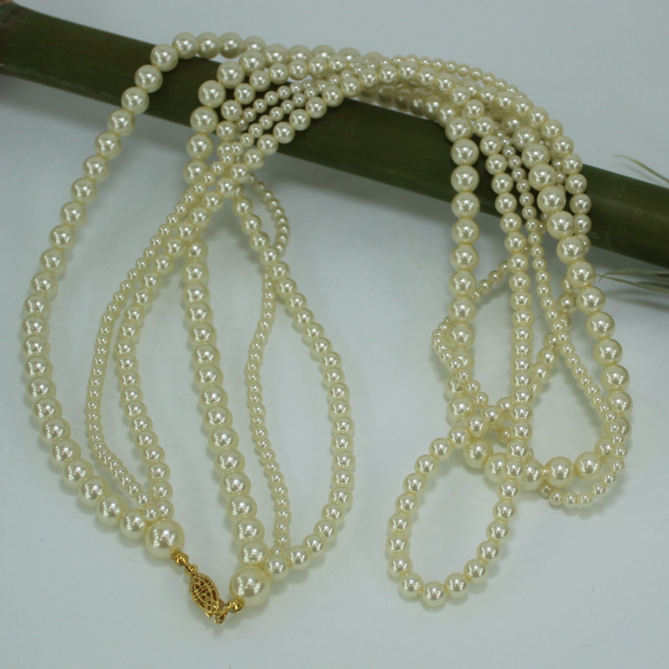 Luminous Long 3 Strand Pearl Necklace Graduated Sizes 32" closeup view