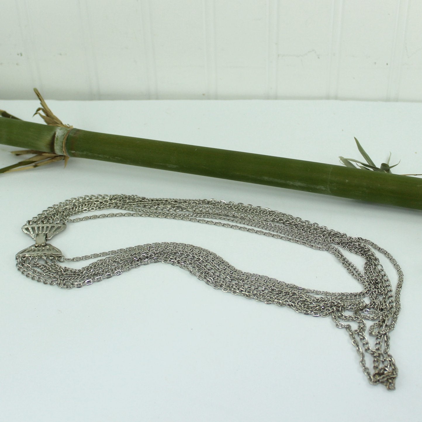 Vintage Necklace 7 Silver Chains Graduated Lengths Large Silver Clasp table view