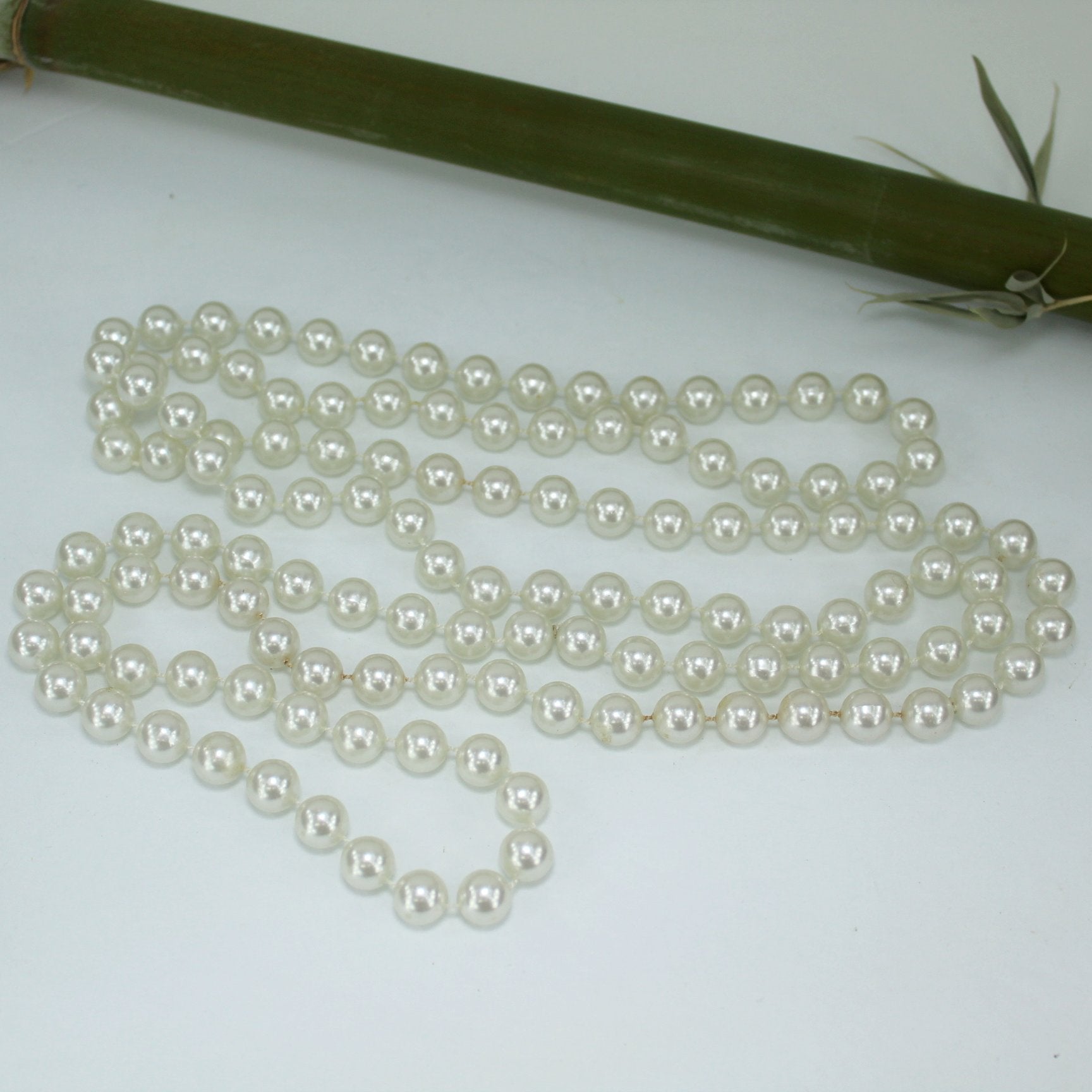 Lariat Rope Necklace Moonlight White Knotted 9mm Pearls 58" Length flat view