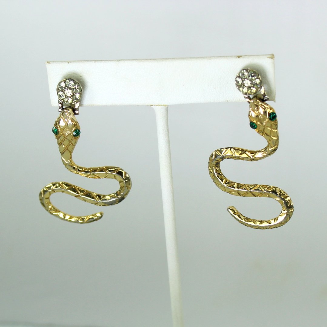 Serpent Snake Post Earrings Costume Glitzy Rhinestones Egyptian Revival closeup as ear view