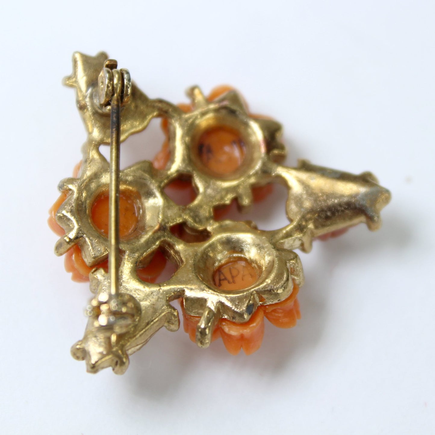 Triangular Pin Faux Coral Pearl Japan reverse of pin showing japan mark