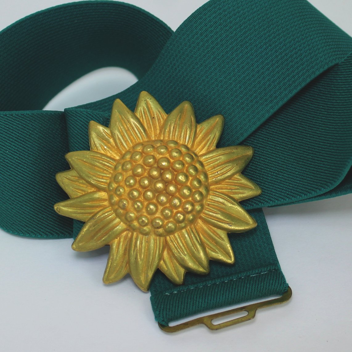 Vintage Turquoise Teal Stretch Belt Metal Sunflower Clip Buckle closeup sunflower