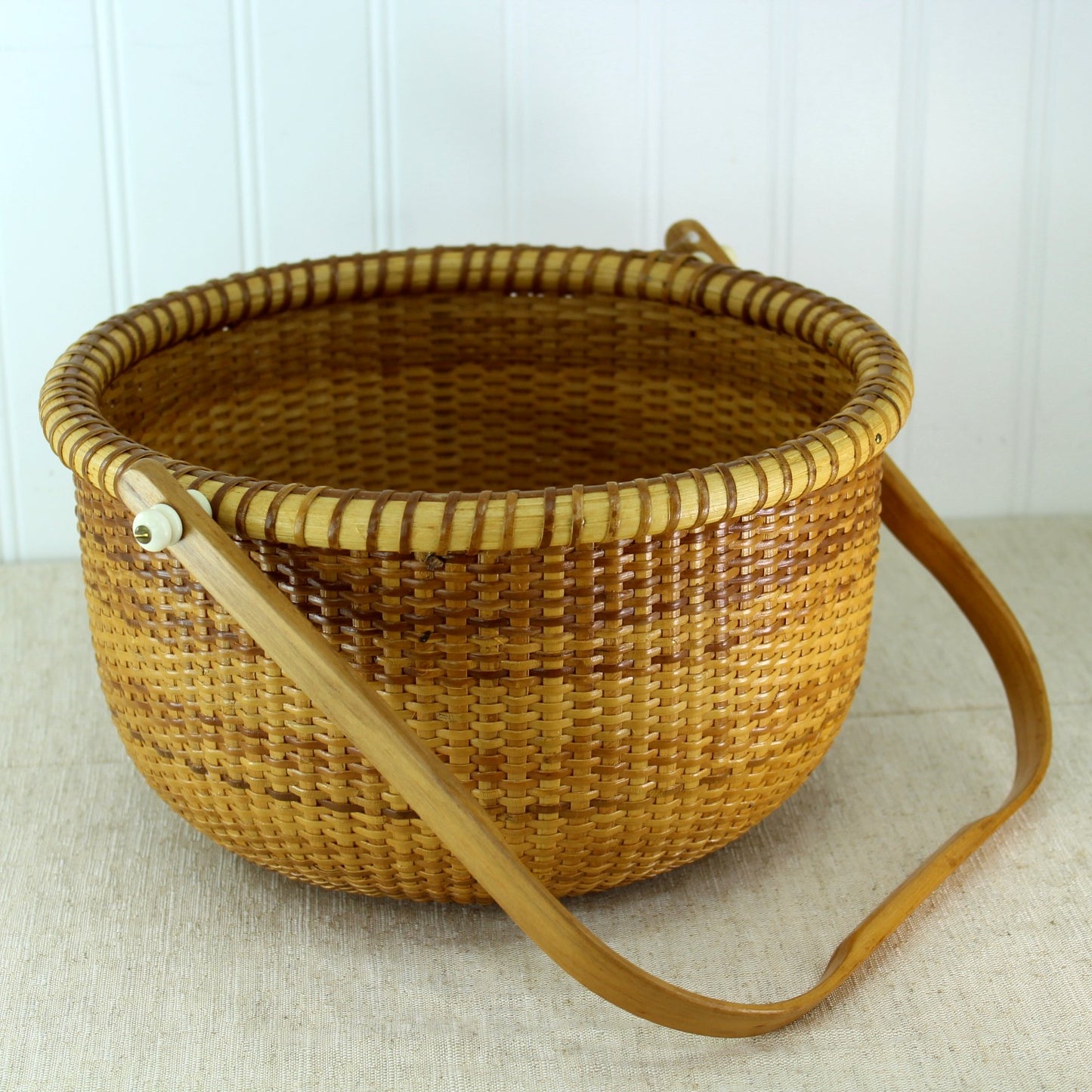 Nantucket Large Open Basket Signed Fisher 1989 Penney Coin Dated Variegated Cane handle down view