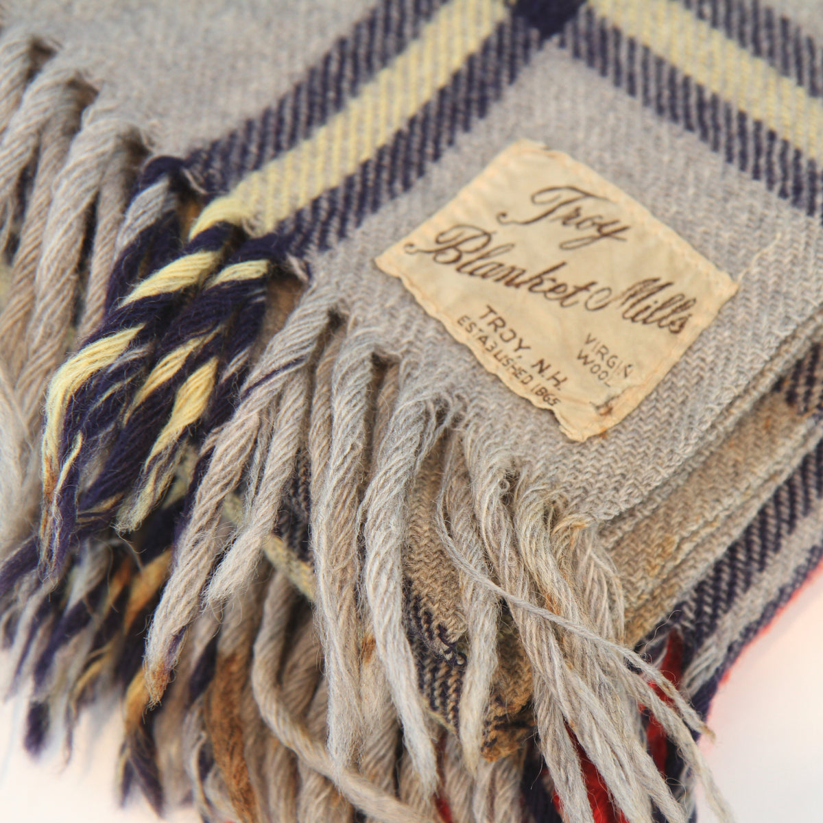 Vintage Troy Plaid Fringed Wool Cabin Camp Blanket 54W x 66L. Has the traditional feel and smell of wool.