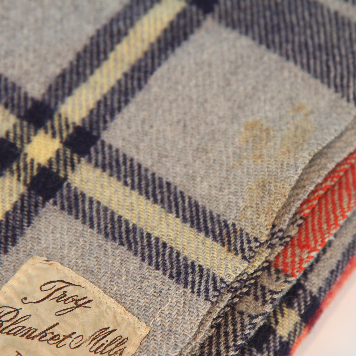 Vintage Troy Plaid Fringed Wool Cabin Camp Blanket 54W x 66L. Has the traditional feel and smell of wool.