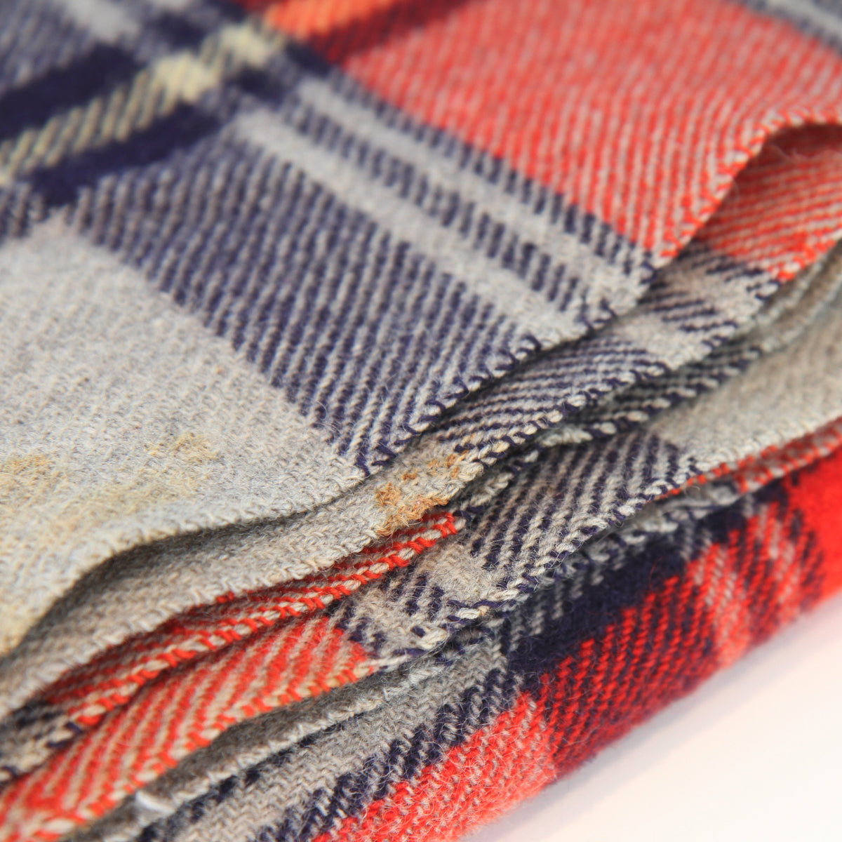 Vintage Troy Plaid Fringed Wool Cabin Camp Blanket 54W x 66L. Has the traditional feel and smell of wool.