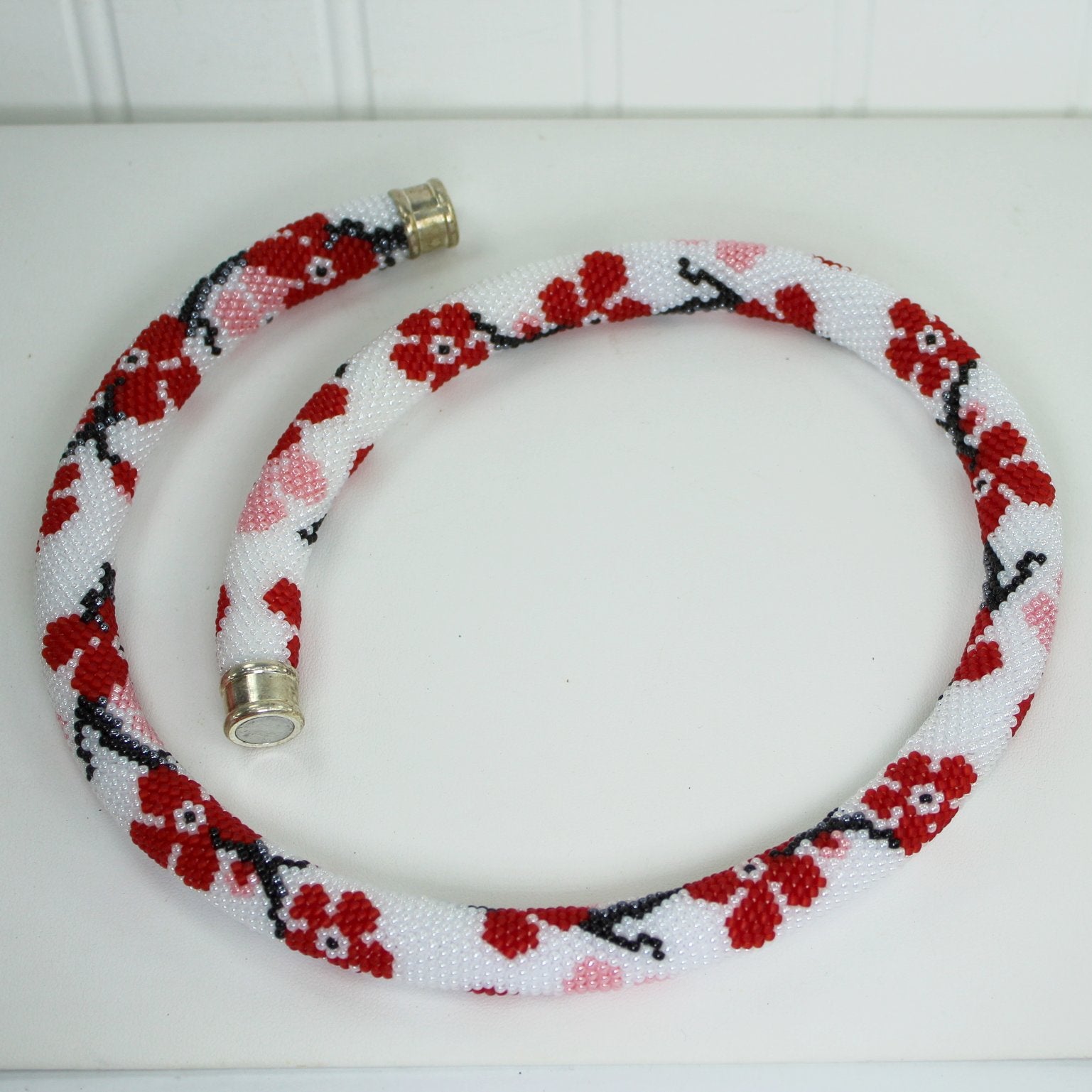 Beaded Flower Round Necklace Rope Shape White Reds Black Magnetic Close necklace open view