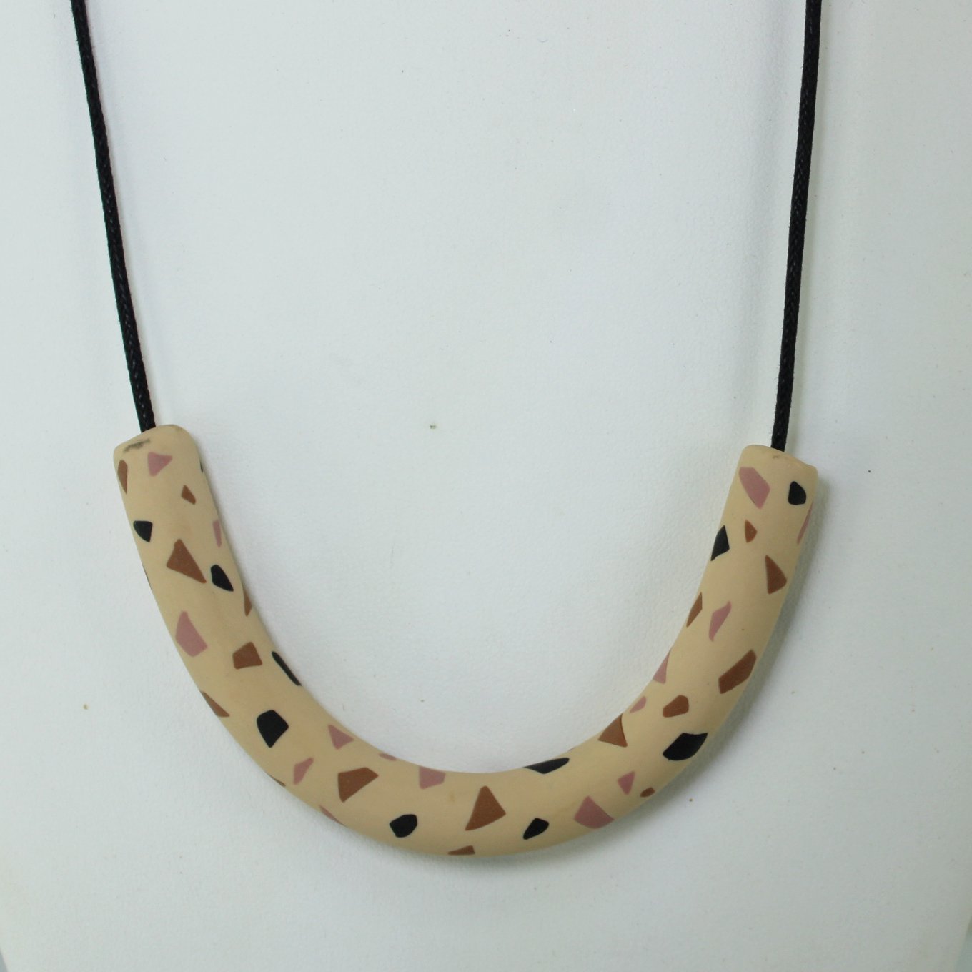 Sylca Ceramic Necklace Crescent Tube Mod Design Beige Black closeup tube focal