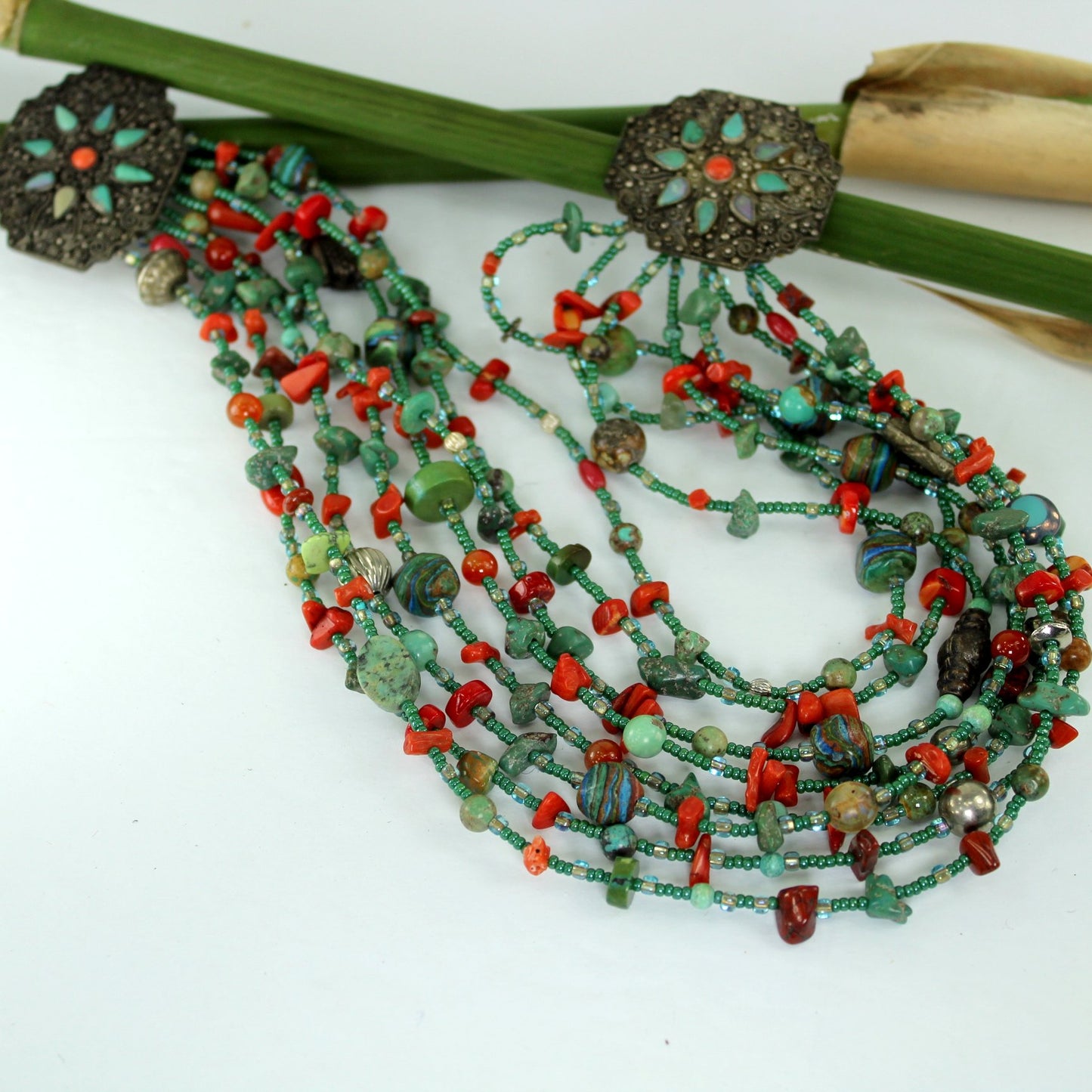 Turquoise Coral Glass Bead Multi Strand Necklace Large Double Medallion Closure flat view necklace