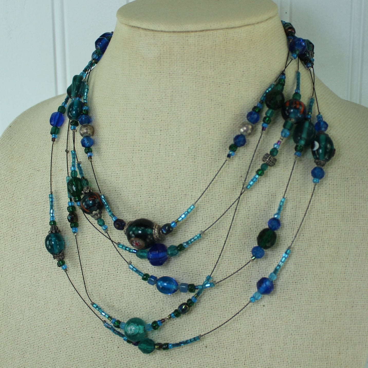 Shiny Iridescent Beads 5 Strand Wire Necklace Shades Blue Turquoise closeup