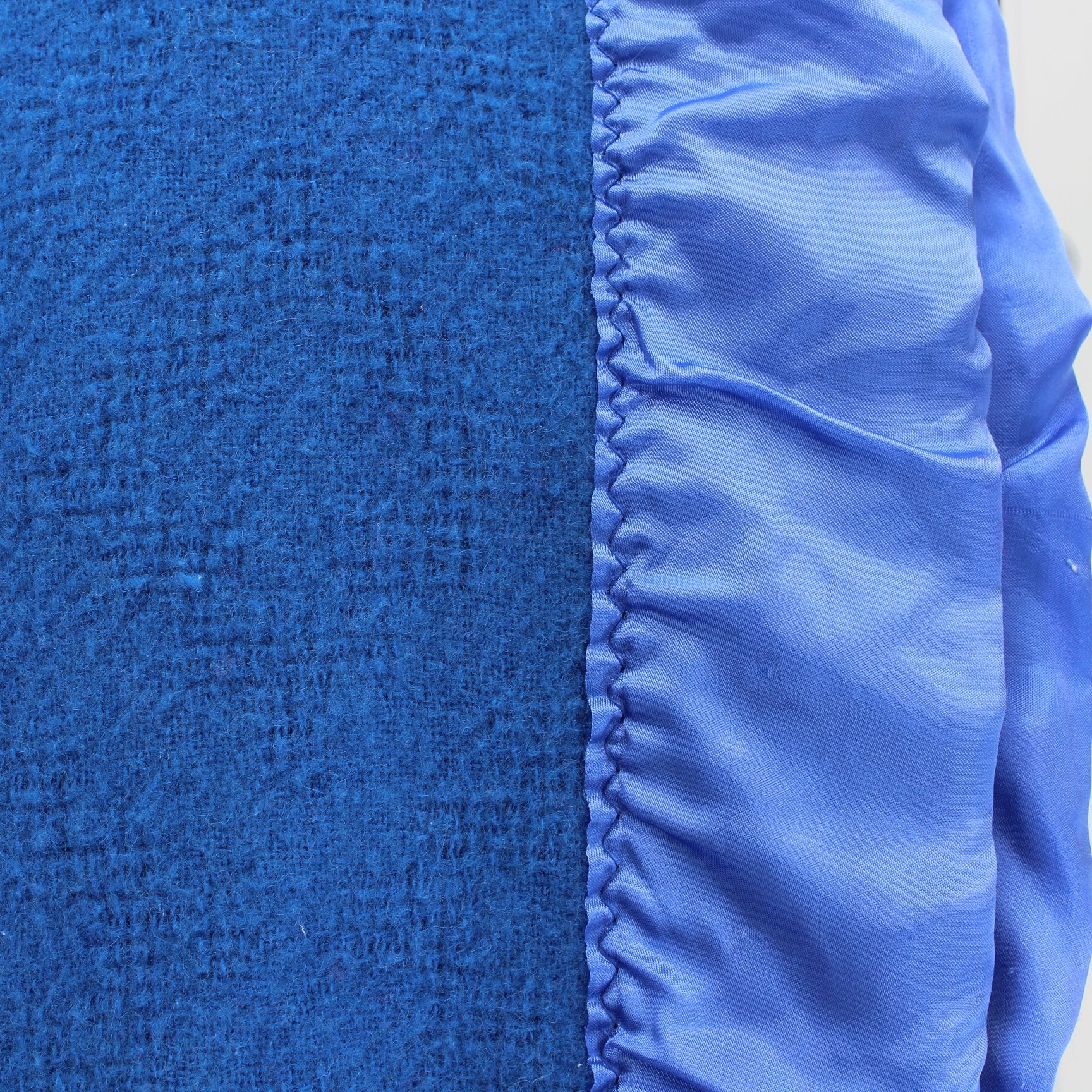 Fieldcrest Royal Velvet Blanket Washable Wool Blend Royal Blue Basketweave closeup view of wool blend fabric